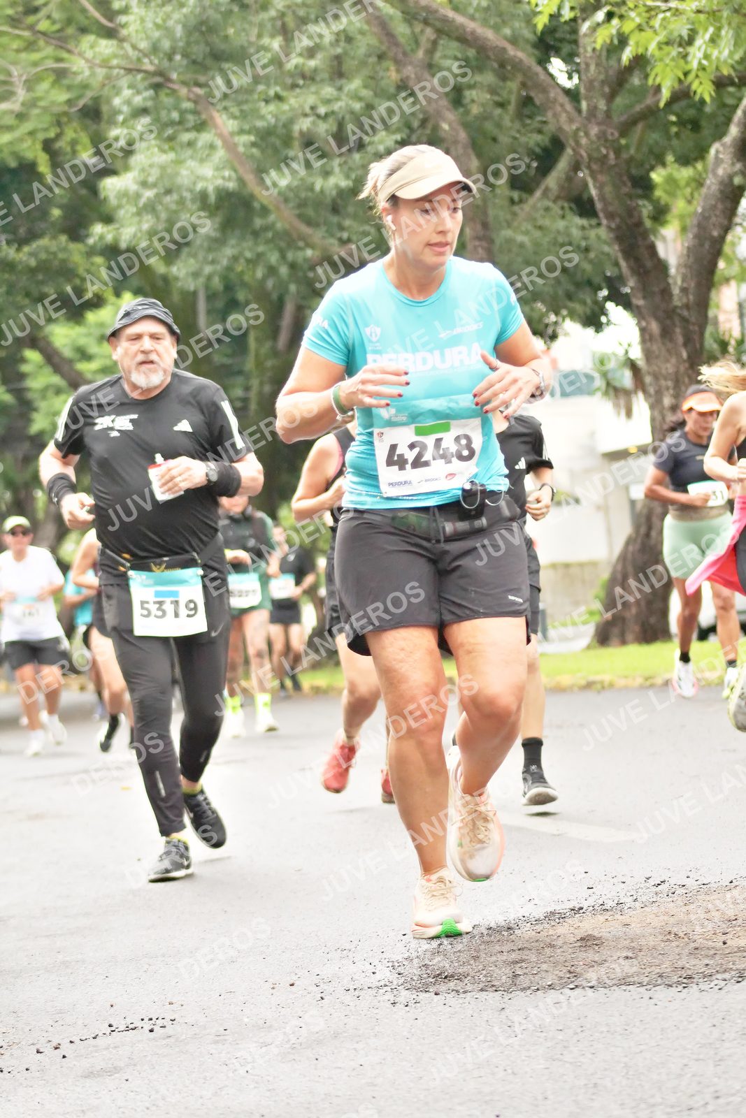 Foto del MEDIO MARATÓN ATLAS en Av. Patria, frente al Parque El Polvorín, Zapopan a las 08:44 · dorsal 4248, 5319