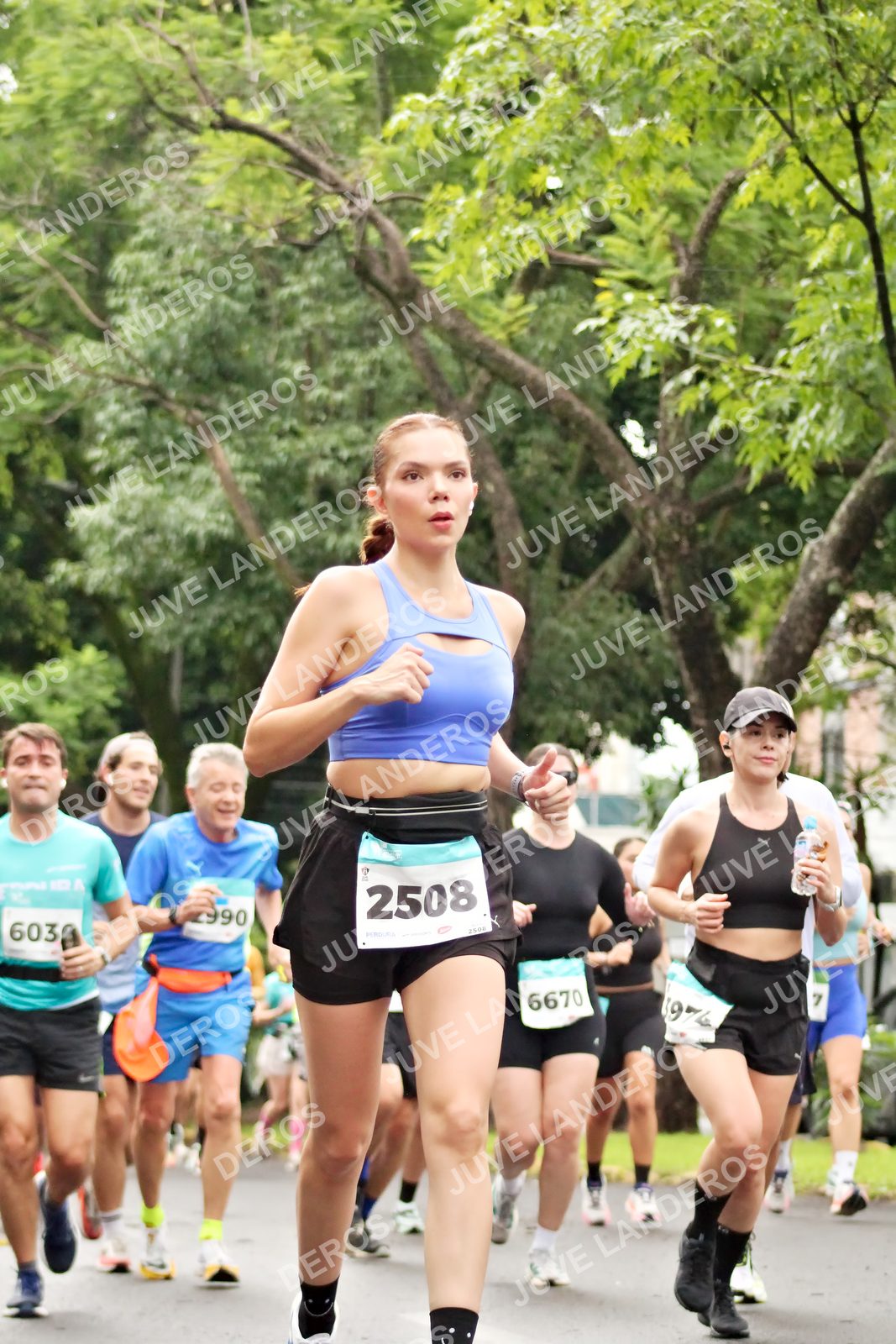 Foto del MEDIO MARATÓN ATLAS en Av. Patria, frente al Parque El Polvorín, Zapopan a las 08:29 · dorsal 2508, 603, 6670, 990