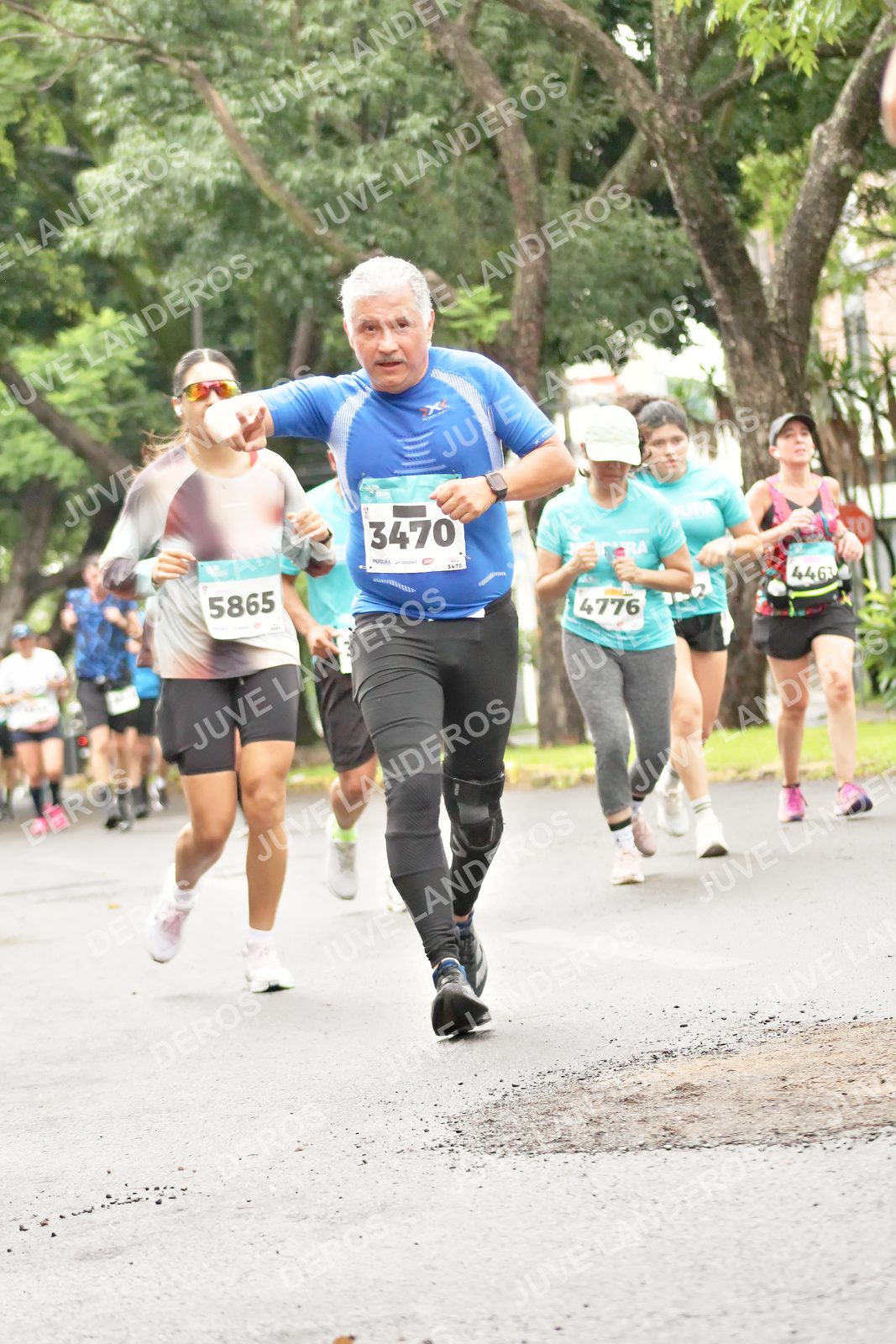 Foto del MEDIO MARATÓN ATLAS en Av. Patria, frente al Parque El Polvorín, Zapopan a las 08:43 · dorsal 3470, 5865, 4776
