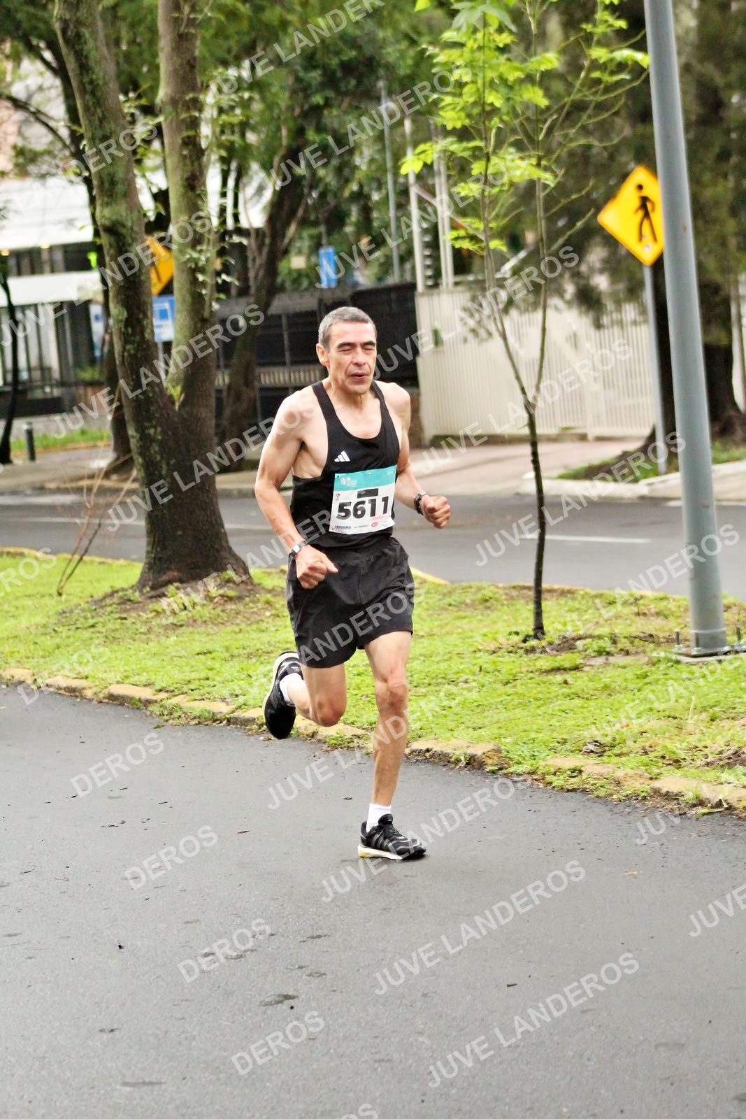 Foto del MEDIO MARATÓN ATLAS en Av. Patria, frente al Parque El Polvorín, Zapopan a las 08:04 · dorsal 5611
