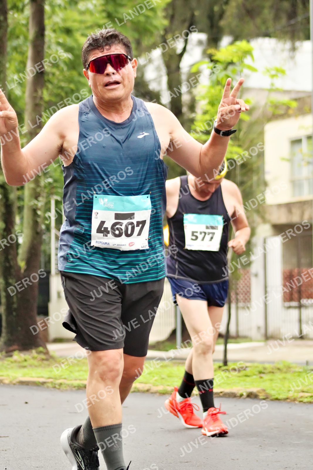 Foto del MEDIO MARATÓN ATLAS en Av. Patria, frente al Parque El Polvorín, Zapopan a las 08:46 · dorsal 4607, 577, 460