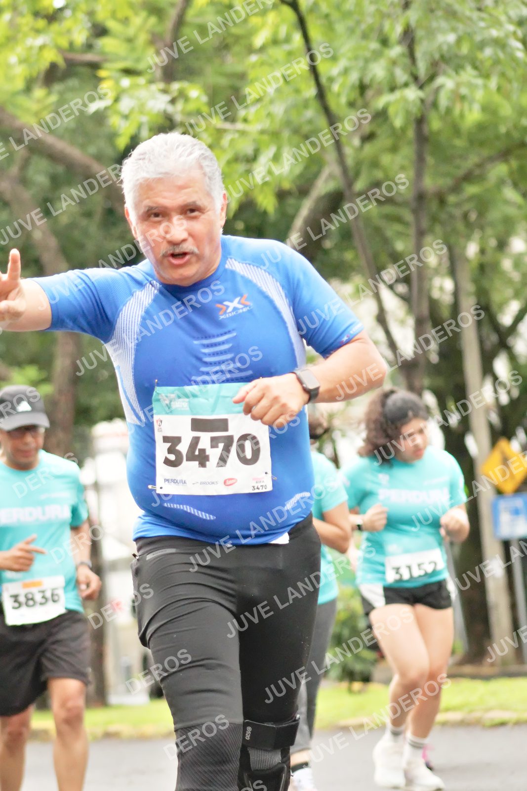 Foto del MEDIO MARATÓN ATLAS en Av. Patria, frente al Parque El Polvorín, Zapopan a las 08:43 · dorsal 3470, 3836, 3152