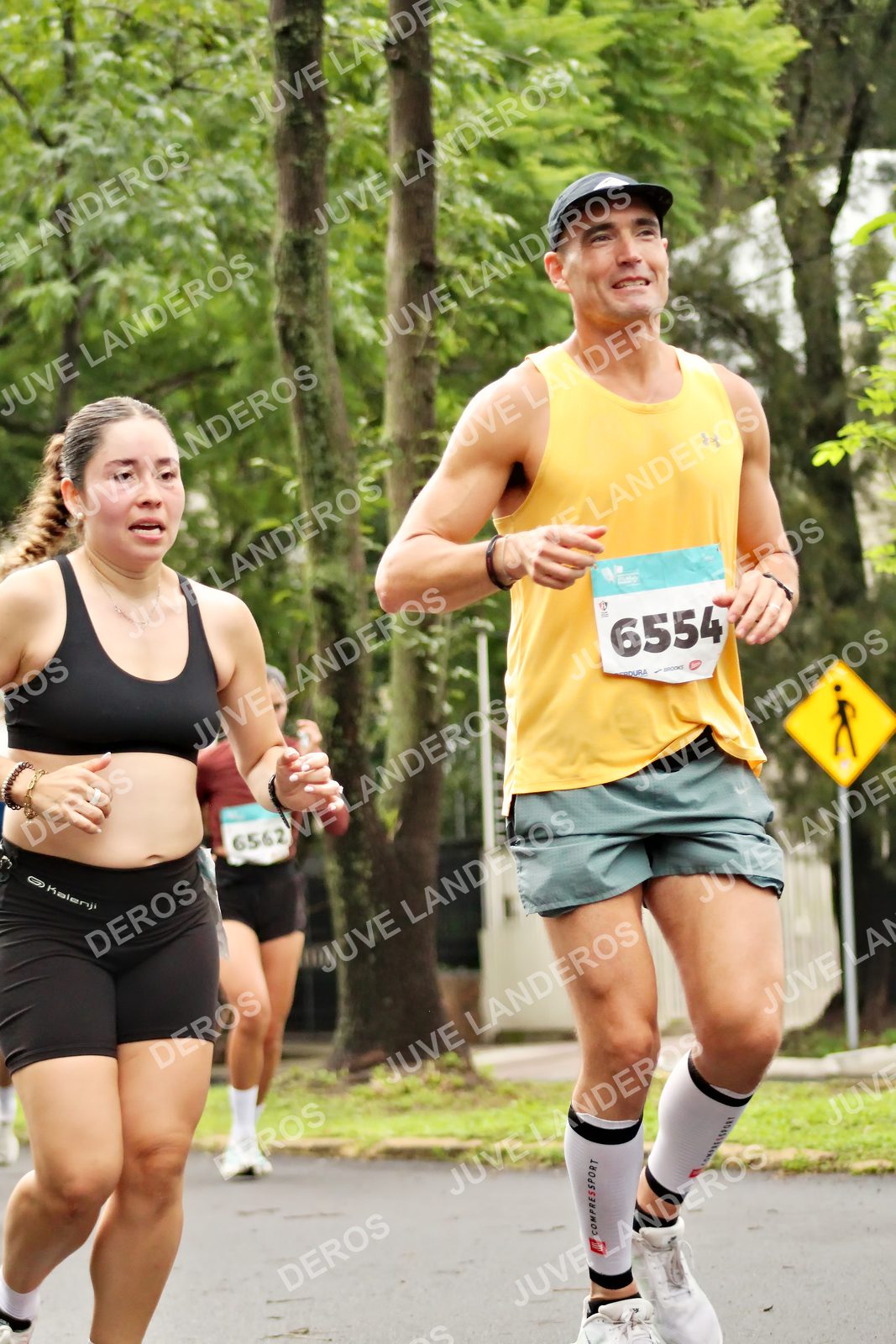 Foto del MEDIO MARATÓN ATLAS en Av. Patria, frente al Parque El Polvorín, Zapopan a las 08:35 · dorsal 6554, 6562