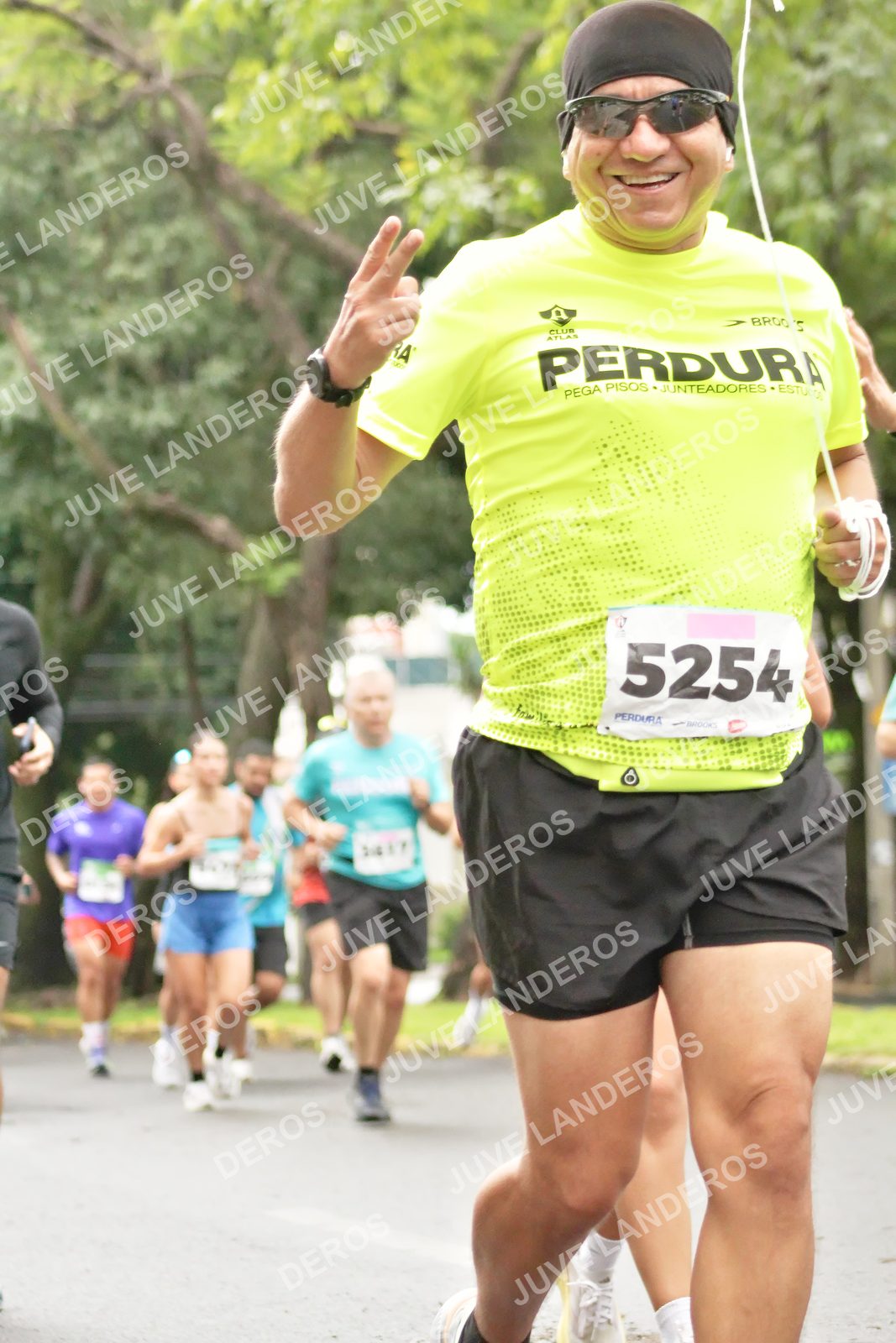 Foto del MEDIO MARATÓN ATLAS en Av. Patria, frente al Parque El Polvorín, Zapopan a las 08:33 · dorsal 5254