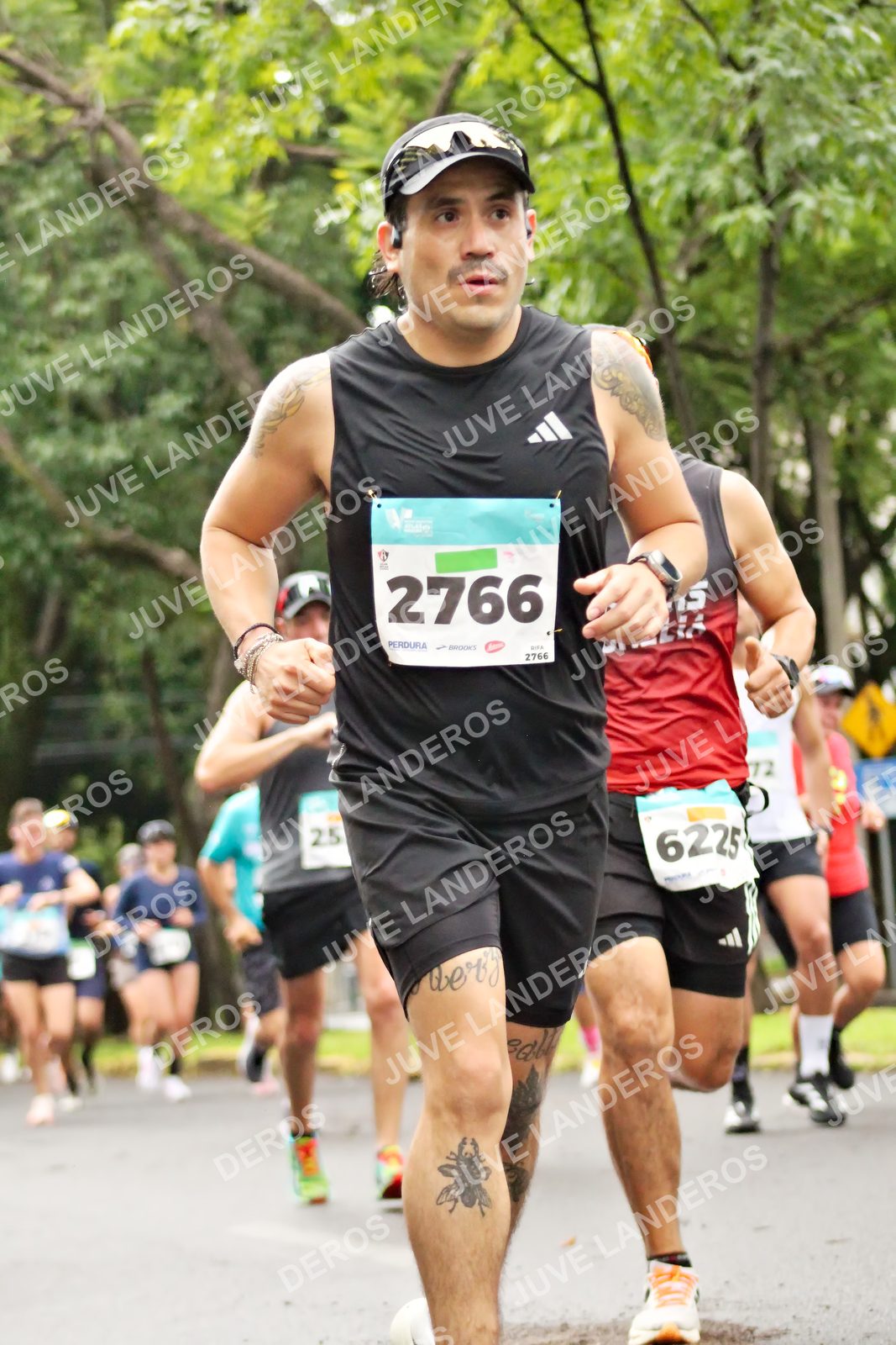 Foto del MEDIO MARATÓN ATLAS en Av. Patria, frente al Parque El Polvorín, Zapopan a las 08:25 · dorsal 2766, 6225, 72, 25