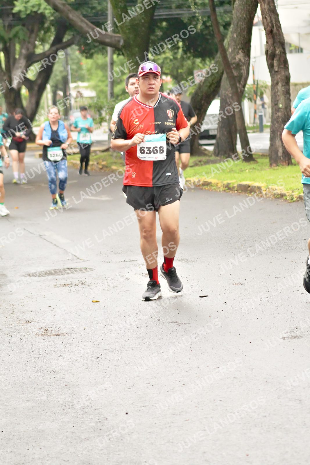 Foto del MEDIO MARATÓN ATLAS en Av. Patria, frente al Parque El Polvorín, Zapopan a las 08:49 · dorsal 6368, 40