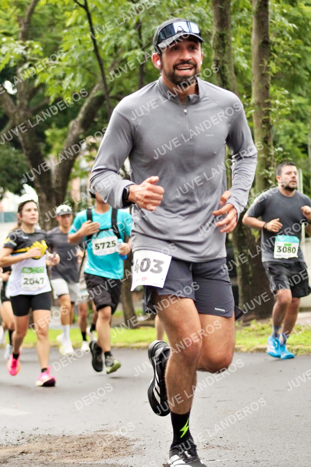 Foto del MEDIO MARATÓN ATLAS en Av. Patria, frente al Parque El Polvorín, Zapopan a las 08:22 · dorsal 3080, 403, 5725, 2047