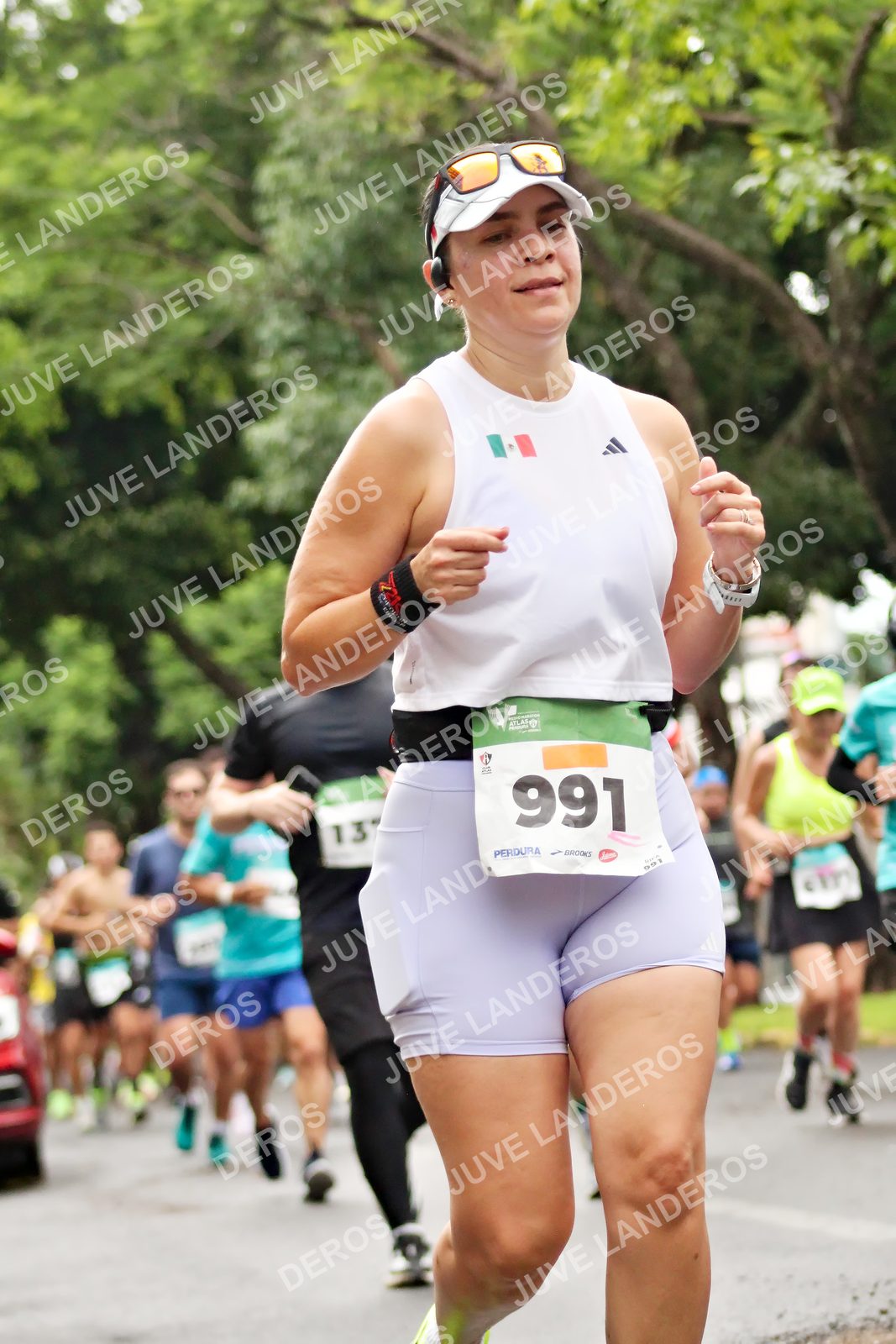 Foto del MEDIO MARATÓN ATLAS en Av. Patria, frente al Parque El Polvorín, Zapopan a las 08:28 · dorsal 991, 13