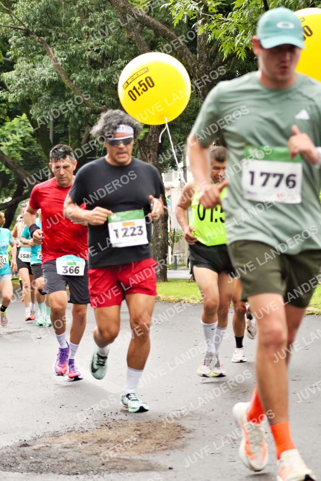 Foto del MEDIO MARATÓN ATLAS en Av. Patria, frente al Parque El Polvorín, Zapopan a las 08:16 · dorsal 1776, 366, 1223, 6