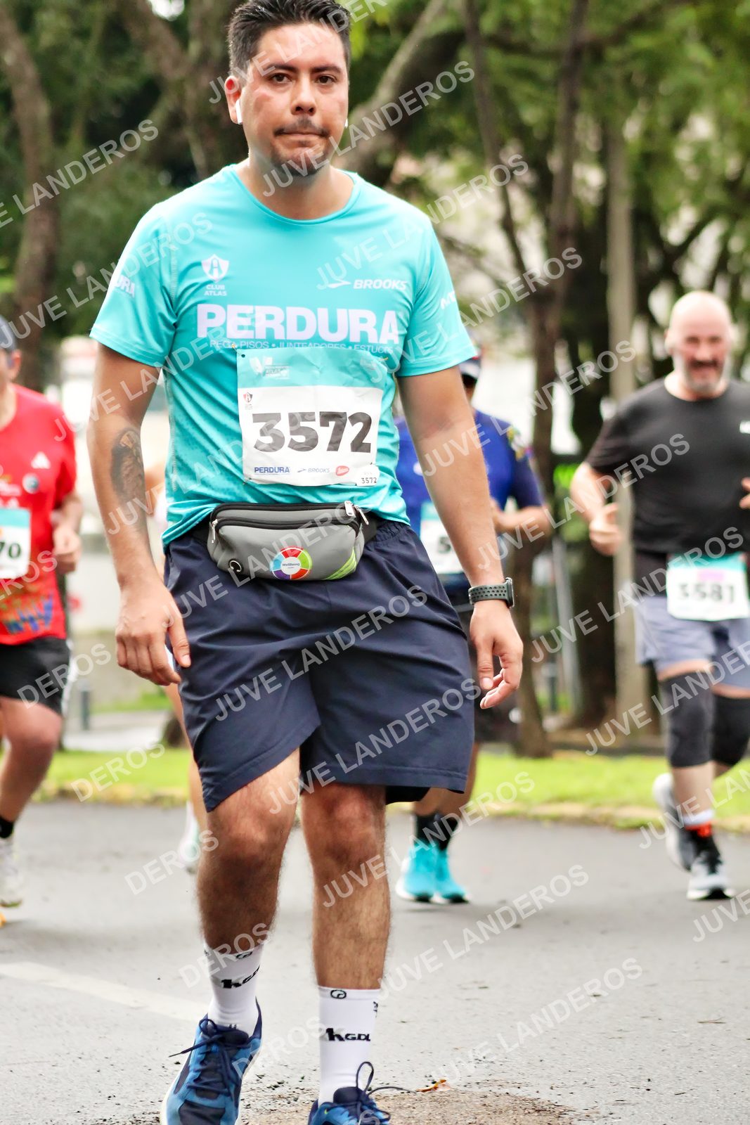 Foto del MEDIO MARATÓN ATLAS en Av. Patria, frente al Parque El Polvorín, Zapopan a las 08:42 · dorsal 3572, 1581