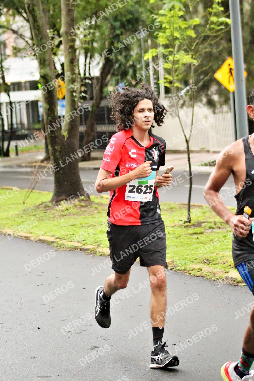 Foto del MEDIO MARATÓN ATLAS en Av. Patria, frente al Parque El Polvorín, Zapopan a las 08:03 · dorsal 2625