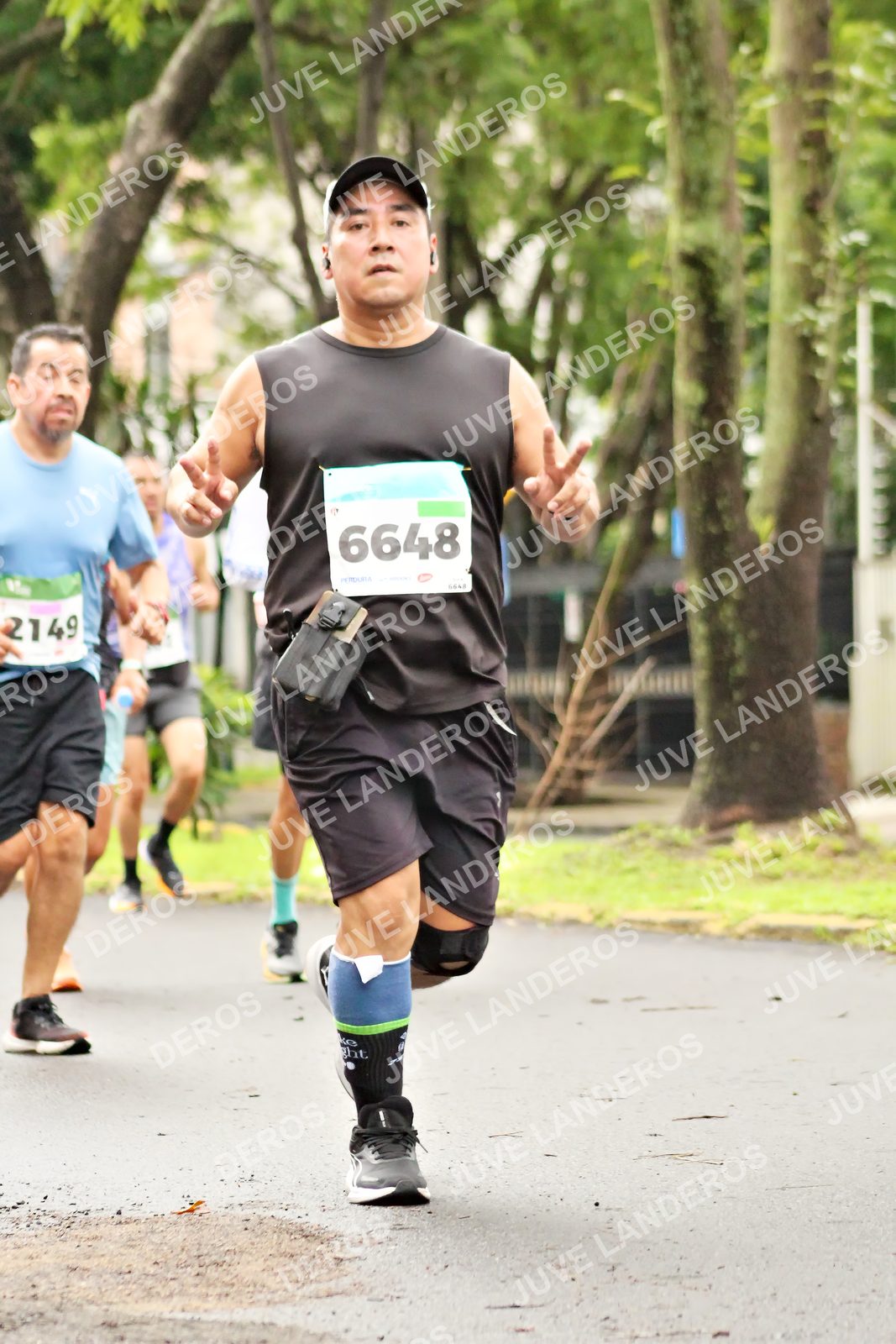 Foto del MEDIO MARATÓN ATLAS en Av. Patria, frente al Parque El Polvorín, Zapopan a las 08:41 · dorsal 6648, 2149