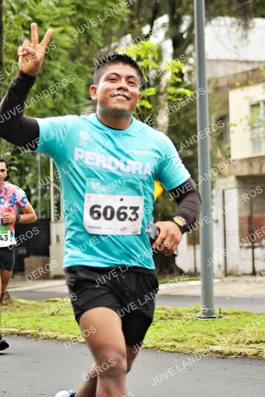 Foto del MEDIO MARATÓN ATLAS en Av. Patria, frente al Parque El Polvorín, Zapopan a las 08:15 · dorsal 6063, 43