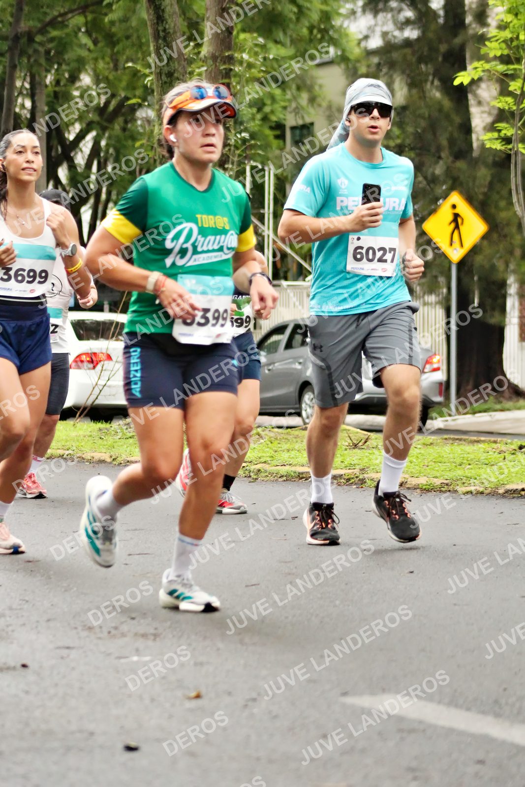 Foto del MEDIO MARATÓN ATLAS en Av. Patria, frente al Parque El Polvorín, Zapopan a las 08:24 · dorsal 6027, 3699