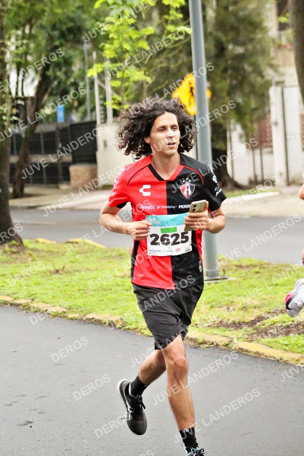 Foto del MEDIO MARATÓN ATLAS en Av. Patria, frente al Parque El Polvorín, Zapopan a las 08:03 · dorsal 2625