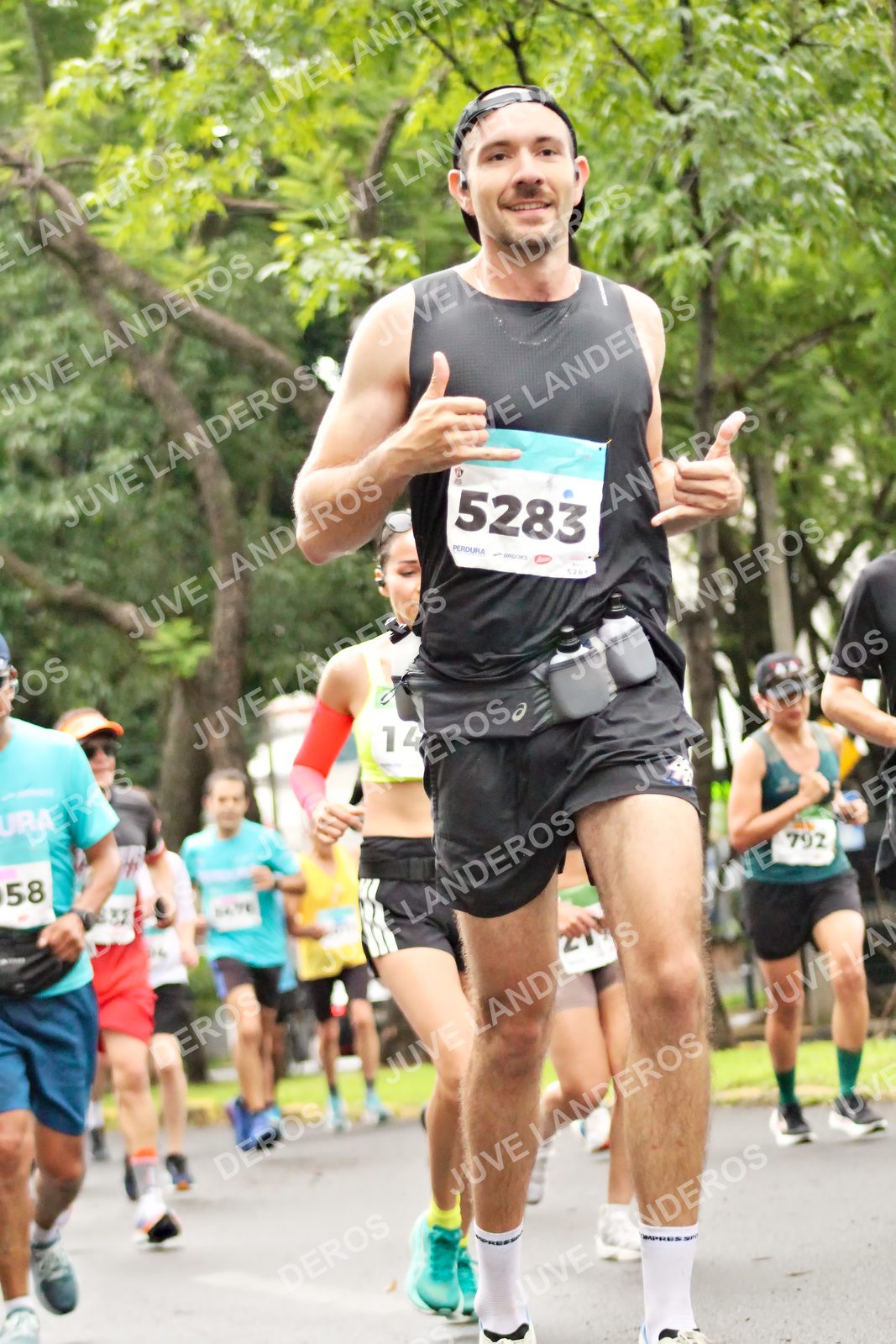 Foto del MEDIO MARATÓN ATLAS en Av. Patria, frente al Parque El Polvorín, Zapopan a las 08:22 · dorsal 5283, 792, 58, 14