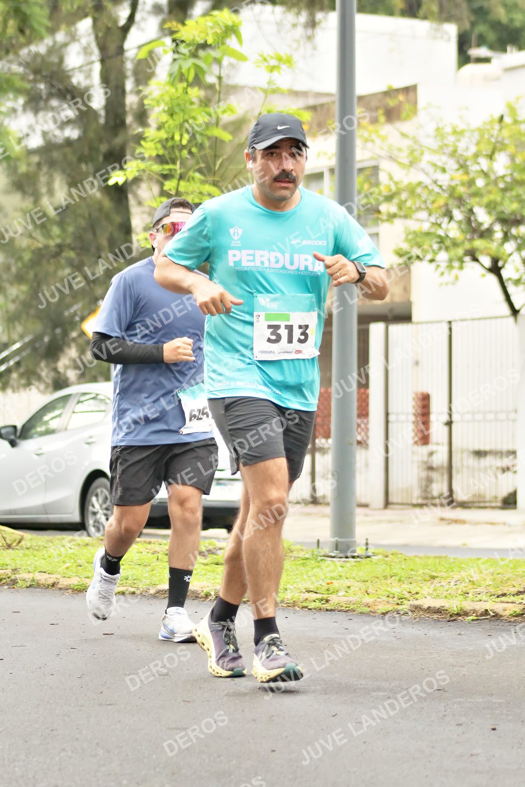 Foto del MEDIO MARATÓN ATLAS en Av. Patria, frente al Parque El Polvorín, Zapopan a las 08:48 · dorsal 313