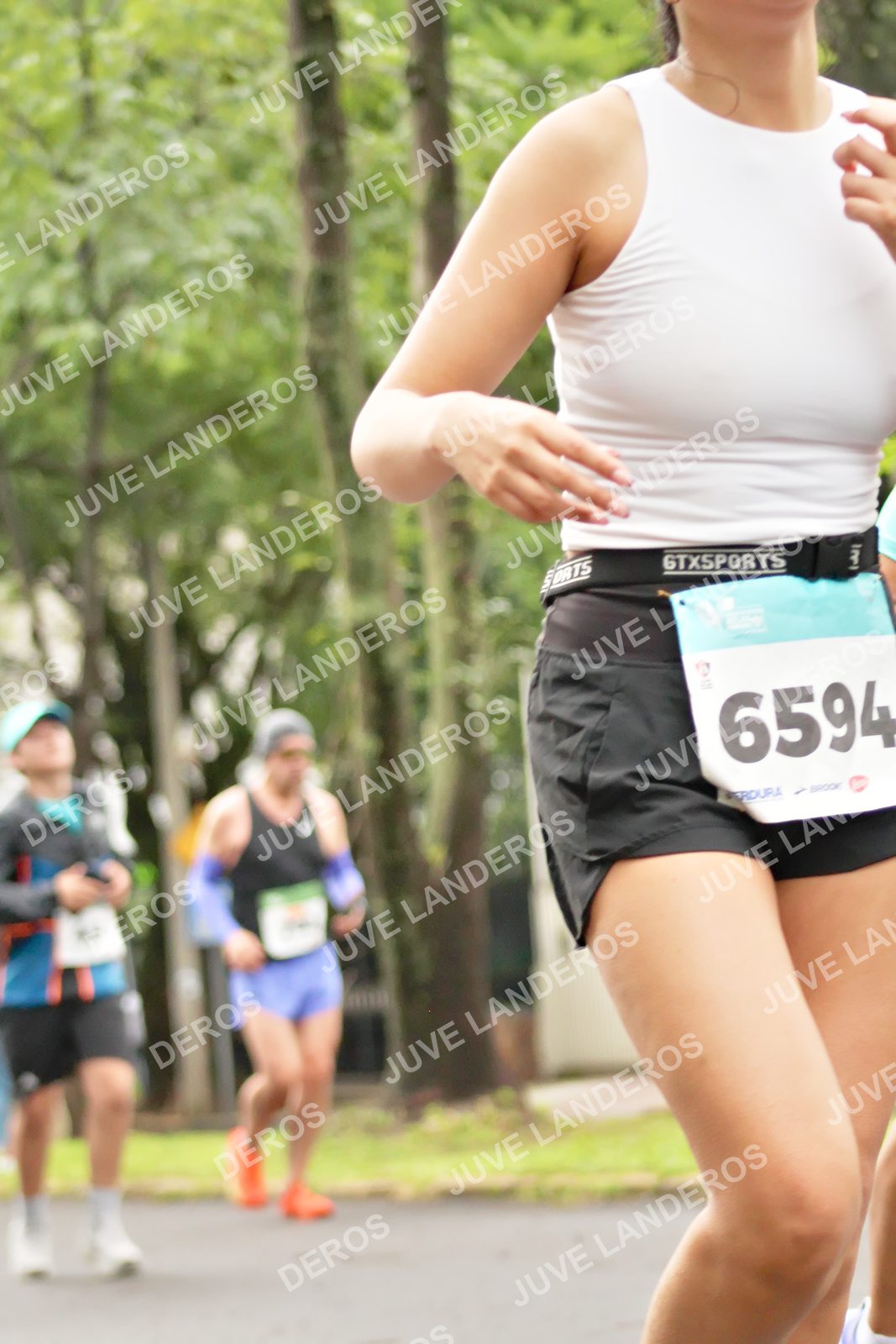 Foto del MEDIO MARATÓN ATLAS en Av. Patria, frente al Parque El Polvorín, Zapopan a las 08:47 · dorsal 6594