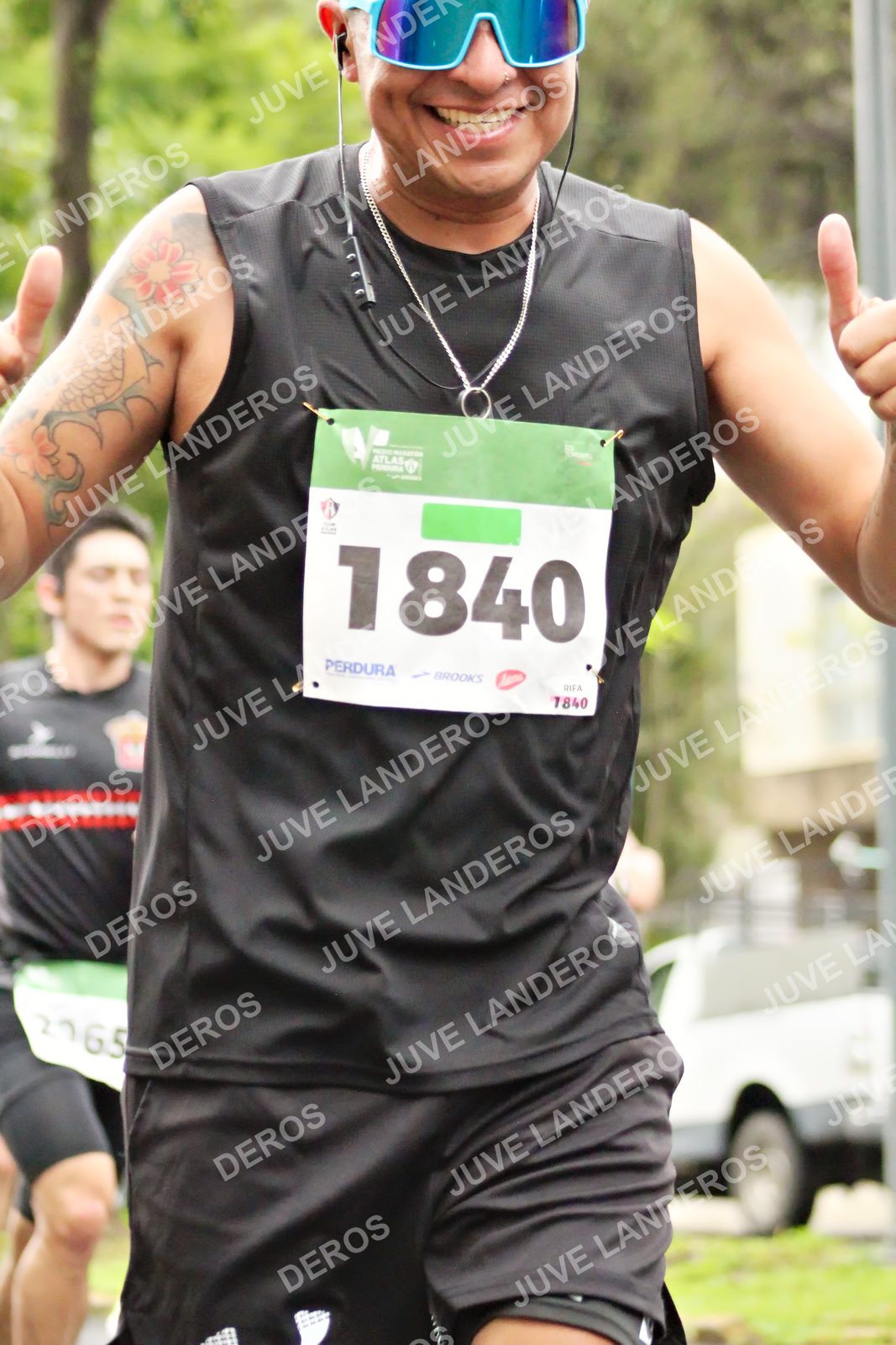 Foto del MEDIO MARATÓN ATLAS en Av. Patria, frente al Parque El Polvorín, Zapopan a las 08:32 · dorsal 1840, 2065