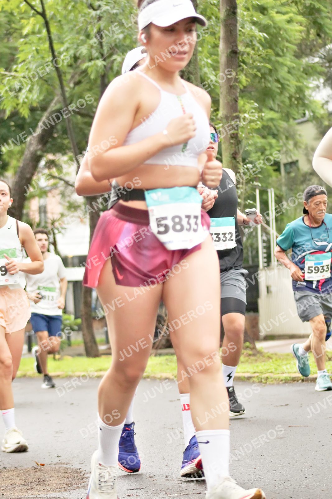 Foto del MEDIO MARATÓN ATLAS en Av. Patria, frente al Parque El Polvorín, Zapopan a las 08:37 · dorsal 5933, 332, 9, 5833