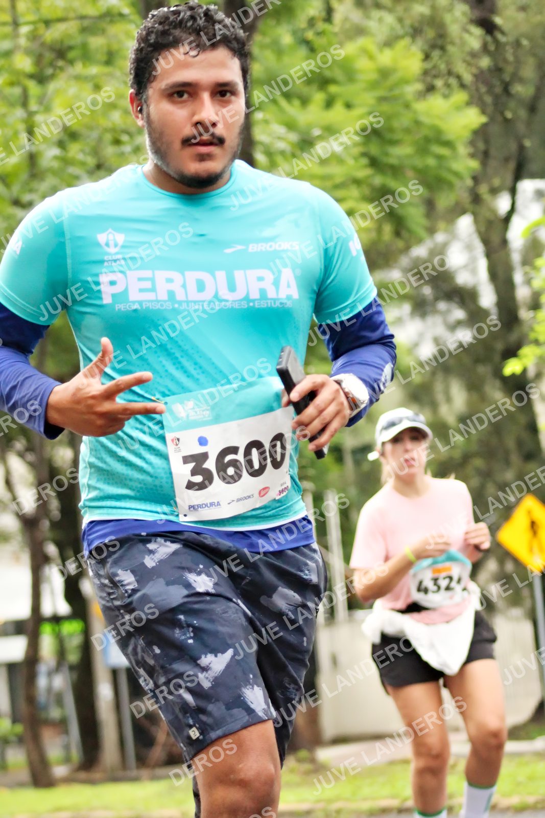 Foto del MEDIO MARATÓN ATLAS en Av. Patria, frente al Parque El Polvorín, Zapopan a las 08:38 · dorsal 3600, 432