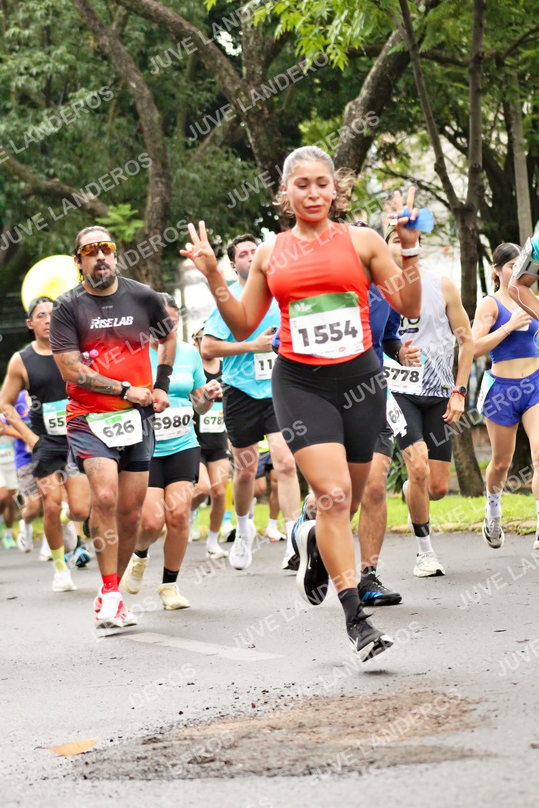 Foto del MEDIO MARATÓN ATLAS en Av. Patria, frente al Parque El Polvorín, Zapopan a las 08:21 · dorsal 626, 5778, 55, 1554