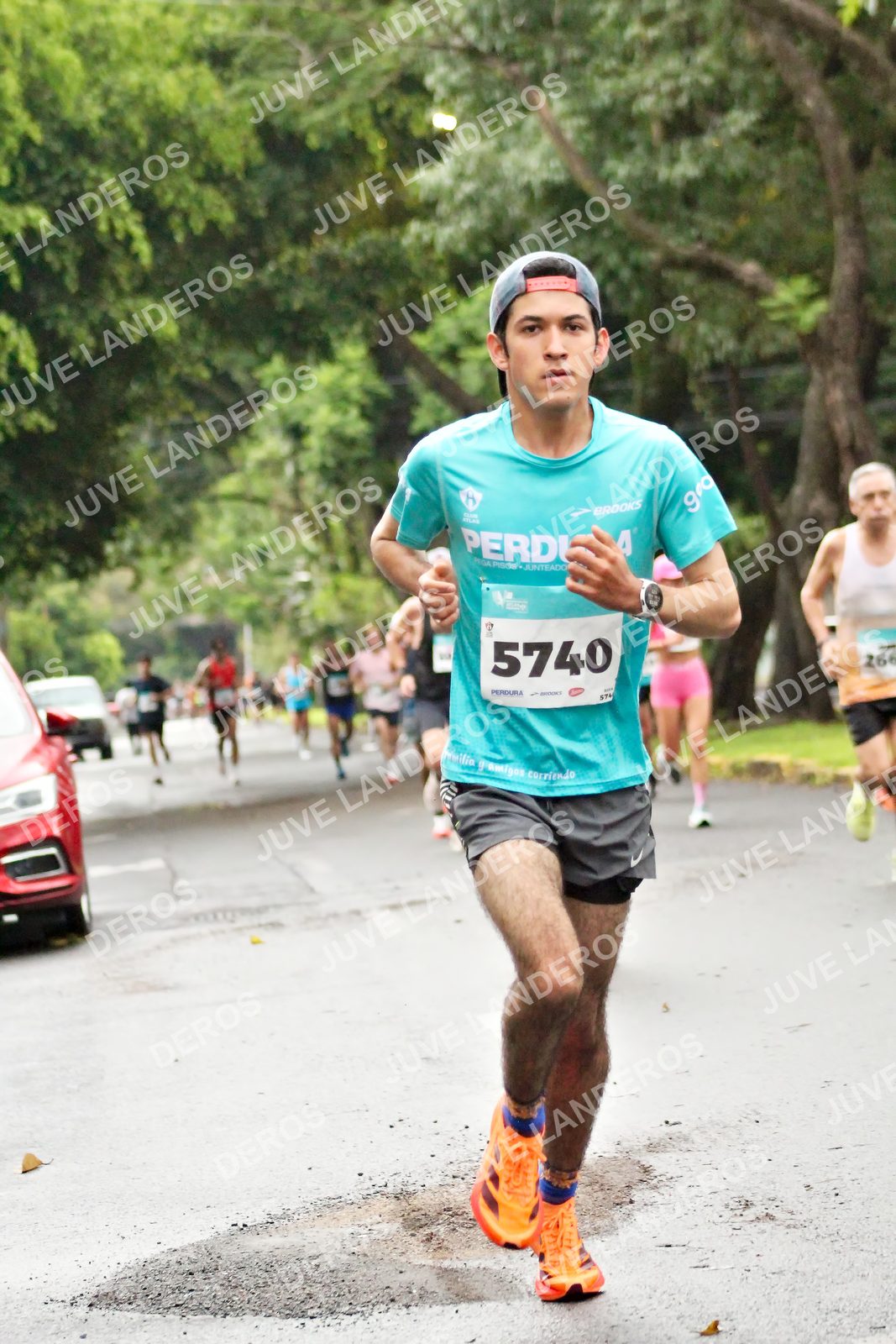 Foto del MEDIO MARATÓN ATLAS en Av. Patria, frente al Parque El Polvorín, Zapopan a las 08:05 · dorsal 5740, 574