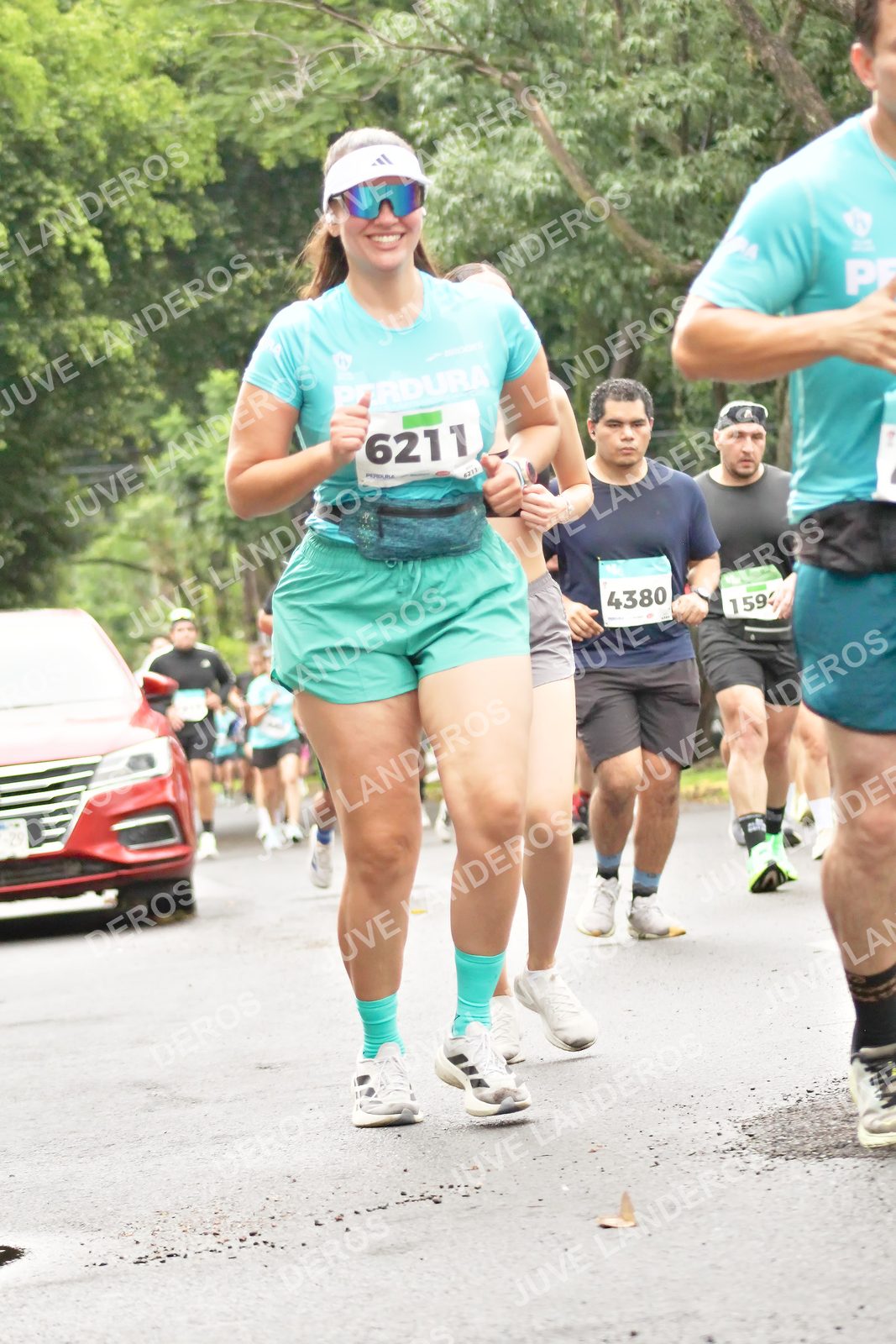 Foto del MEDIO MARATÓN ATLAS en Av. Patria, frente al Parque El Polvorín, Zapopan a las 08:42 · dorsal 4380, 6211, 59, 1