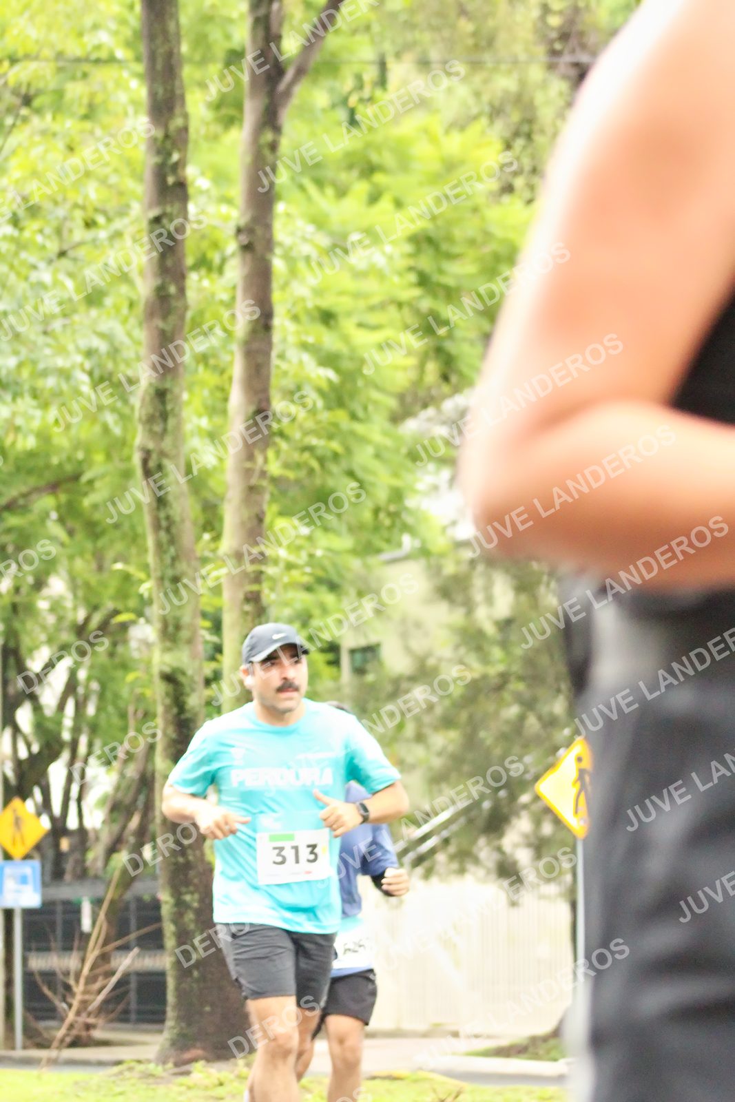 Foto del MEDIO MARATÓN ATLAS en Av. Patria, frente al Parque El Polvorín, Zapopan a las 08:48 · dorsal 313