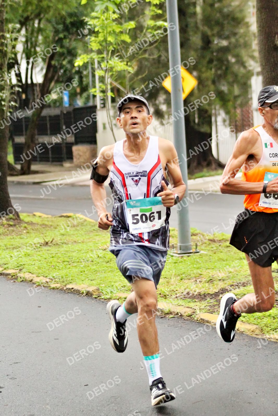 Foto del MEDIO MARATÓN ATLAS en Av. Patria, frente al Parque El Polvorín, Zapopan a las 08:06 · dorsal 5061