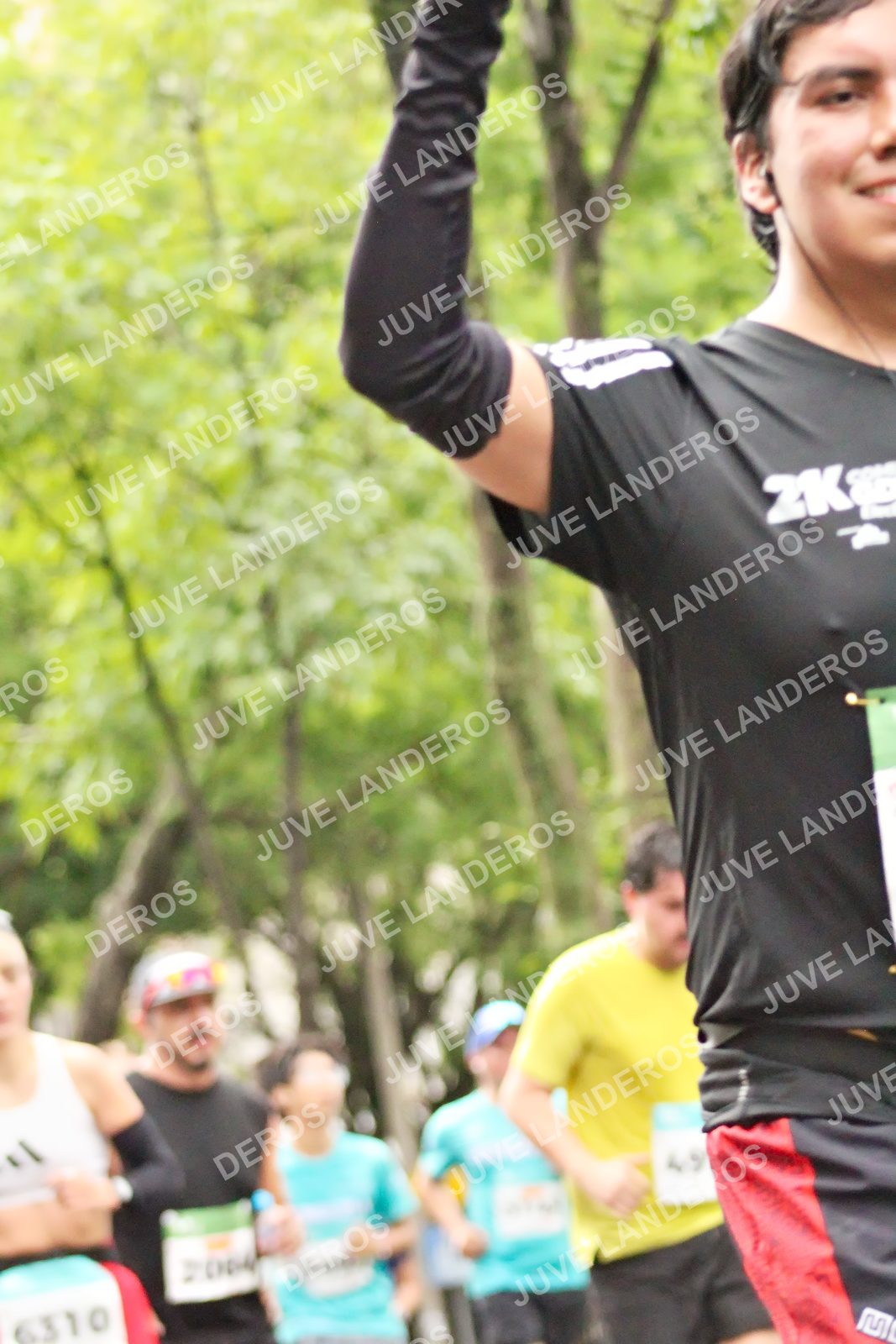 Foto del MEDIO MARATÓN ATLAS en Av. Patria, frente al Parque El Polvorín, Zapopan a las 08:31 · dorsal 6310, 49