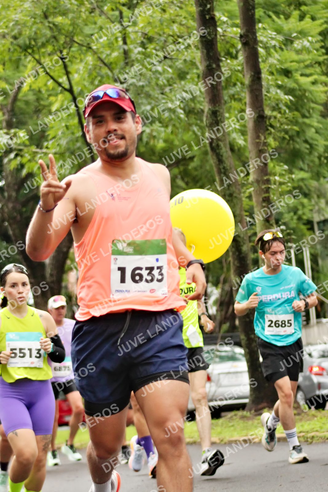 Foto del MEDIO MARATÓN ATLAS en Av. Patria, frente al Parque El Polvorín, Zapopan a las 08:28 · dorsal 5513, 2685, 1633, 10