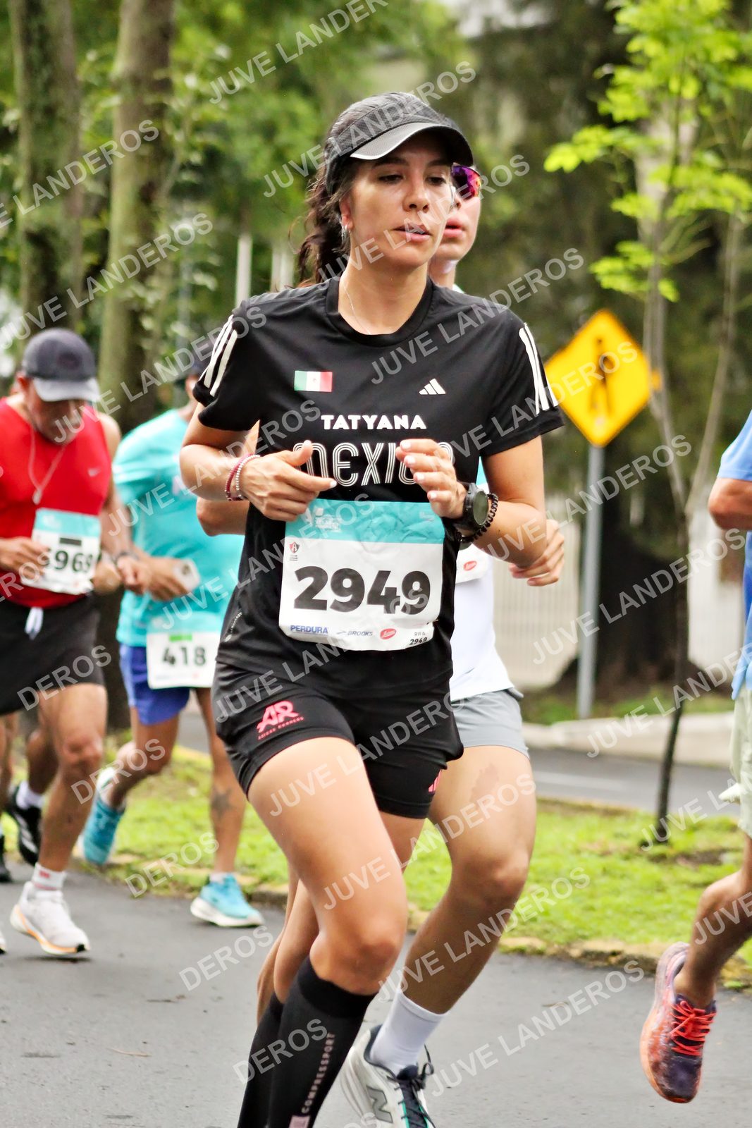 Foto del MEDIO MARATÓN ATLAS en Av. Patria, frente al Parque El Polvorín, Zapopan a las 08:19 · dorsal 2949, 418, 969