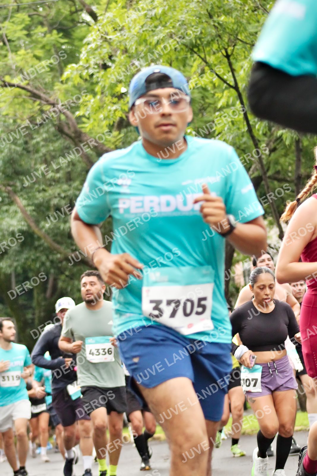 Foto del MEDIO MARATÓN ATLAS en Av. Patria, frente al Parque El Polvorín, Zapopan a las 08:31 · dorsal 3705, 4336, 3119, 7