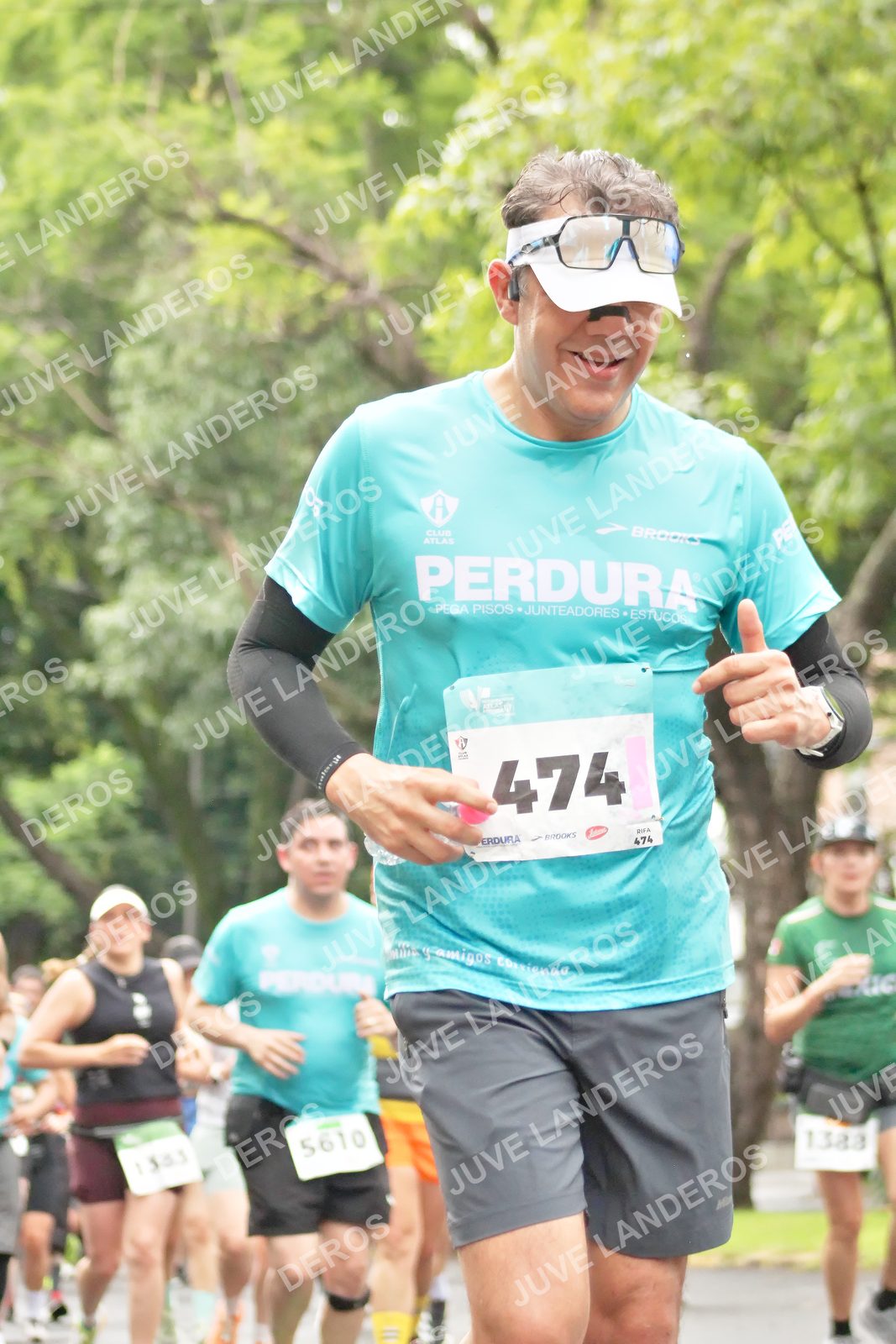 Foto del MEDIO MARATÓN ATLAS en Av. Patria, frente al Parque El Polvorín, Zapopan a las 08:38 · dorsal 474, 5610