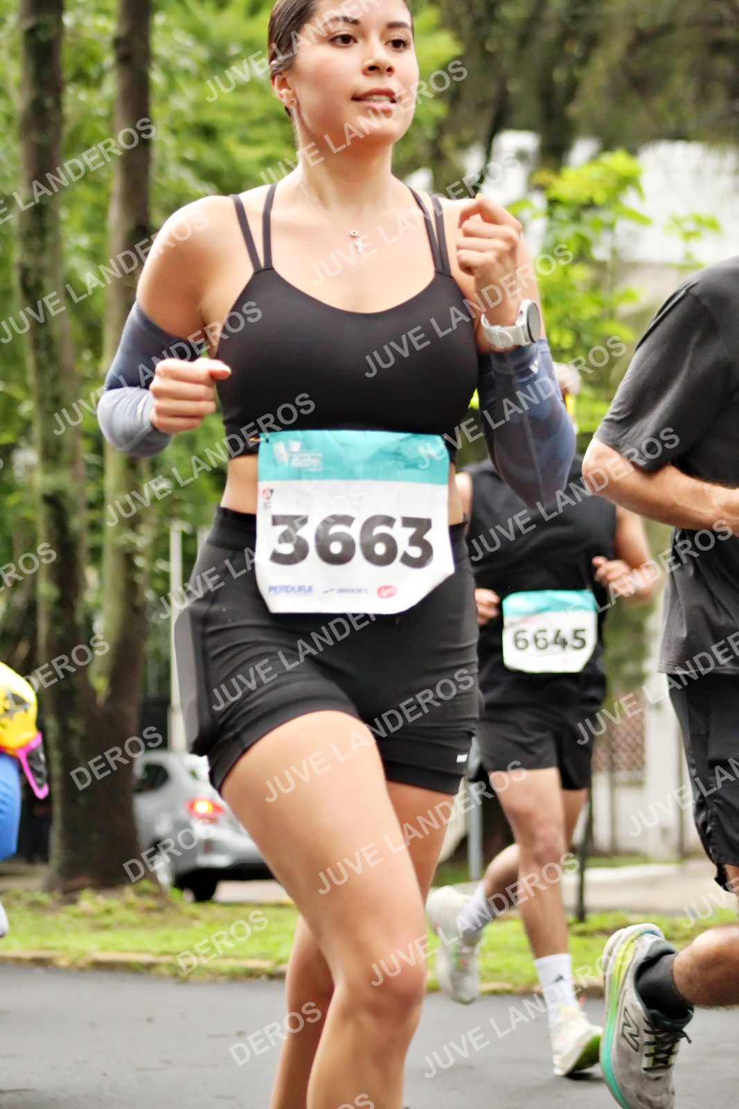 Foto del MEDIO MARATÓN ATLAS en Av. Patria, frente al Parque El Polvorín, Zapopan a las 08:26 · dorsal 3663, 6645