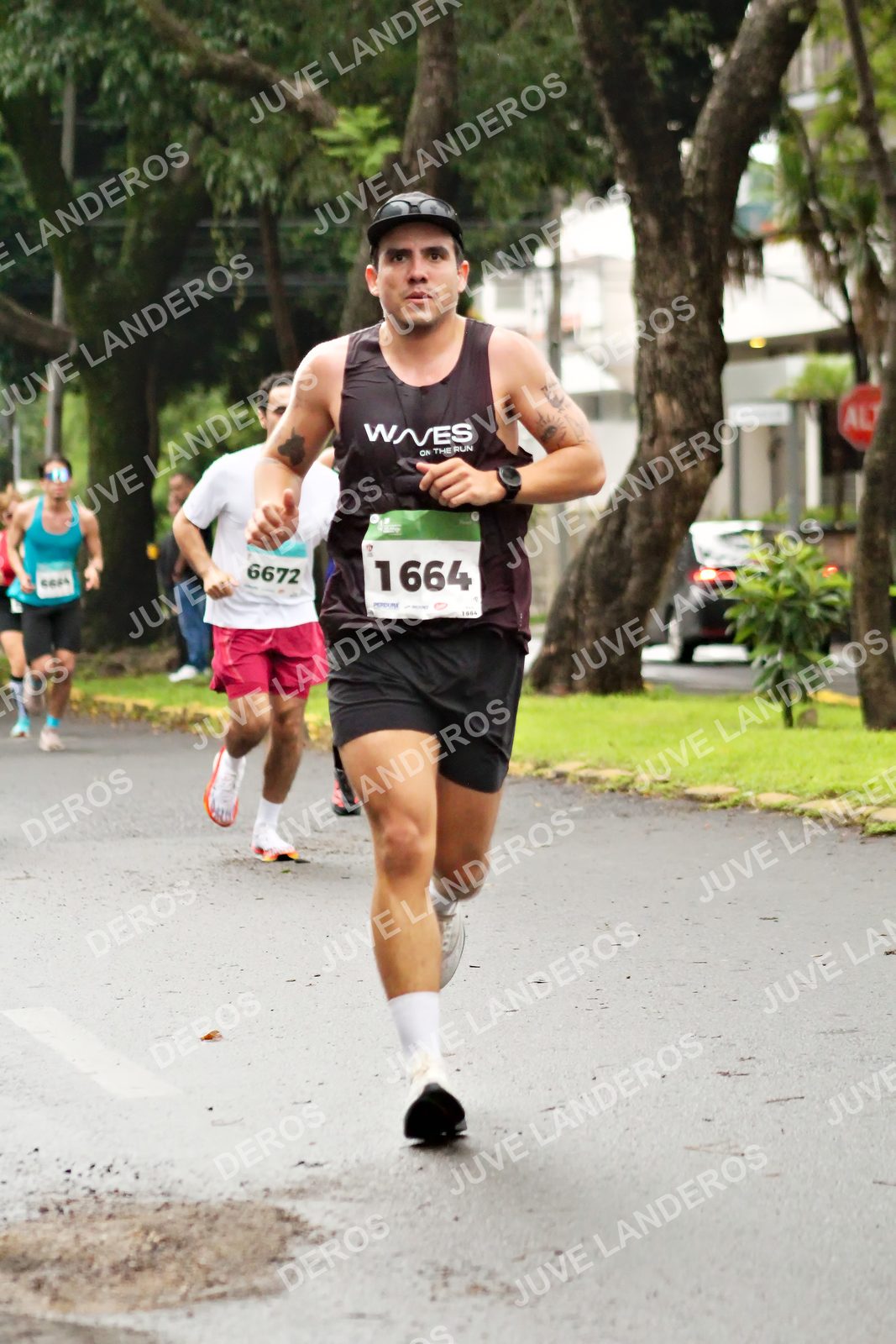 Foto del MEDIO MARATÓN ATLAS en Av. Patria, frente al Parque El Polvorín, Zapopan a las 08:14 · dorsal 6672, 1664