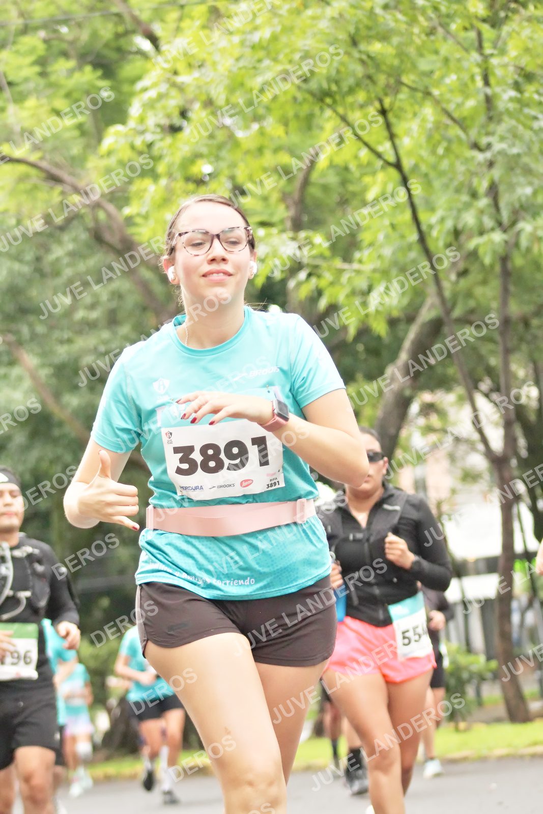 Foto del MEDIO MARATÓN ATLAS en Av. Patria, frente al Parque El Polvorín, Zapopan a las 08:42 · dorsal 3891, 554
