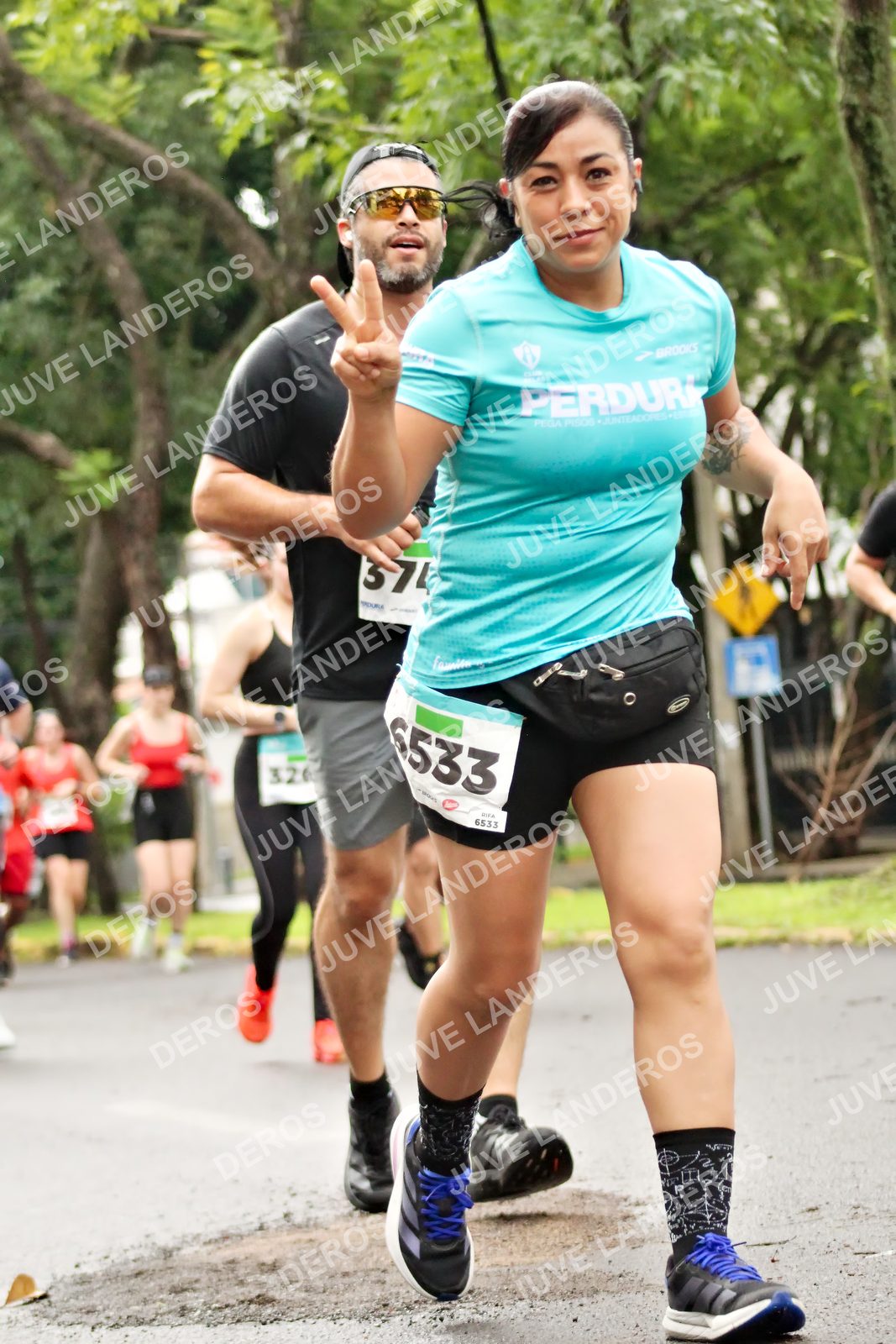 Foto del MEDIO MARATÓN ATLAS en Av. Patria, frente al Parque El Polvorín, Zapopan a las 08:33 · dorsal 6533, 374, 326