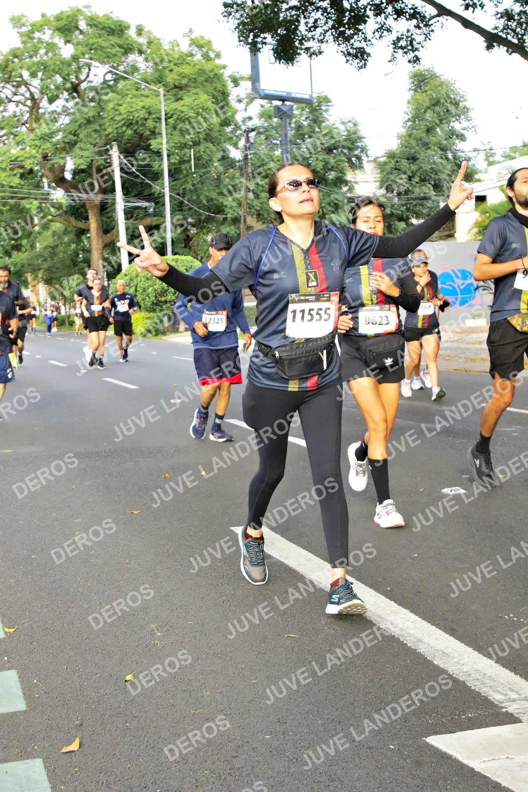 Foto de la X Carrera Leones Negros Red Cola 2026 en Rectoría General de la UdeG, Av. Juárez 976 (meta en Av. Enrique Díaz de León y Pedro Moreno), Guadalajara a las 08:08 · dorsal 9623, 11555, 12325