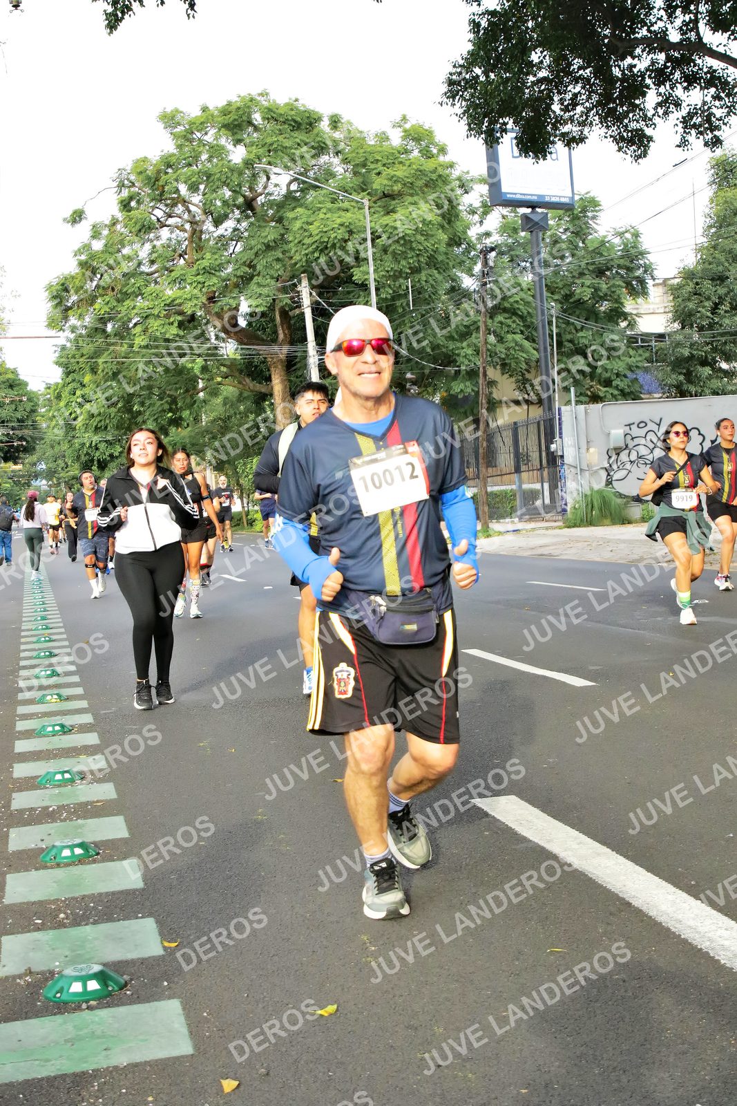 Foto de la X Carrera Leones Negros Red Cola 2026 en Rectoría General de la UdeG, Av. Juárez 976 (meta en Av. Enrique Díaz de León y Pedro Moreno), Guadalajara a las 08:06 · dorsal 10012, 9919
