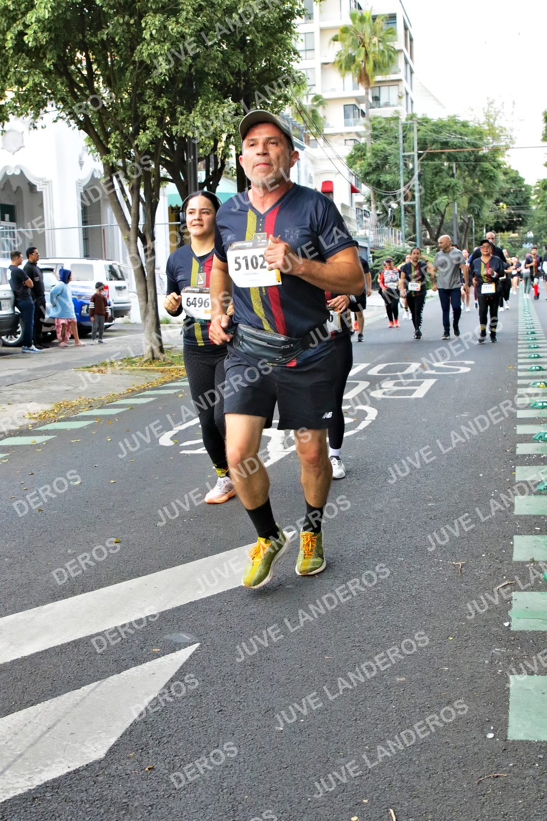 Foto de la X Carrera Leones Negros Red Cola 2026 en Rectoría General de la UdeG, Av. Juárez 976 (meta en Av. Enrique Díaz de León y Pedro Moreno), Guadalajara a las 07:14 · dorsal 5102, 6496, 78