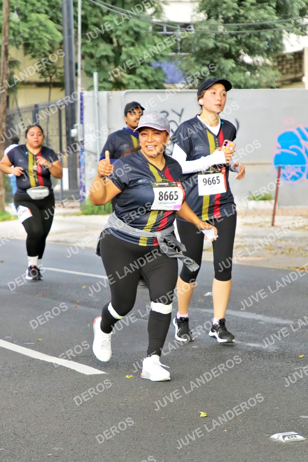 Foto de la X Carrera Leones Negros Red Cola 2026 en Rectoría General de la UdeG, Av. Juárez 976 (meta en Av. Enrique Díaz de León y Pedro Moreno), Guadalajara a las 08:19 · dorsal 8665, 9665
