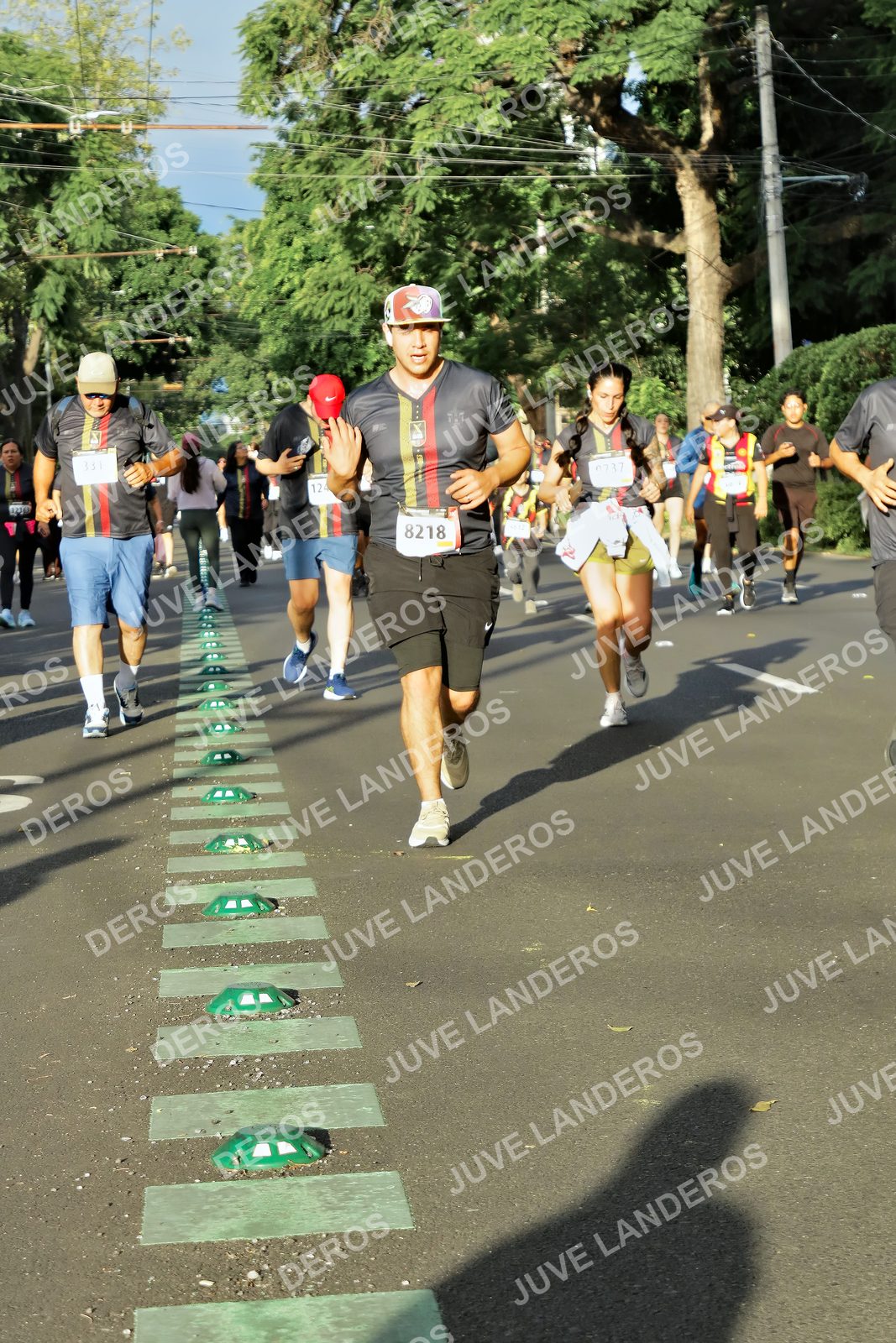 Foto de la X Carrera Leones Negros Red Cola 2026 en Rectoría General de la UdeG, Av. Juárez 976 (meta en Av. Enrique Díaz de León y Pedro Moreno), Guadalajara a las 07:45 · dorsal 8218, 12, 9737