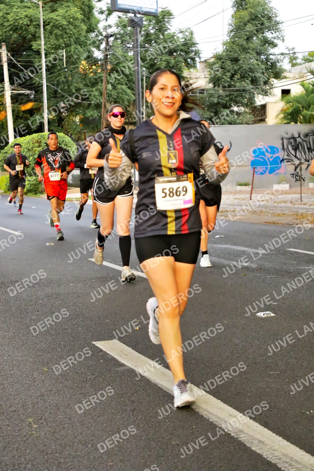 Foto de la X Carrera Leones Negros Red Cola 2026 en Rectoría General de la UdeG, Av. Juárez 976 (meta en Av. Enrique Díaz de León y Pedro Moreno), Guadalajara a las 05:00 · dorsal 5869, 6777
