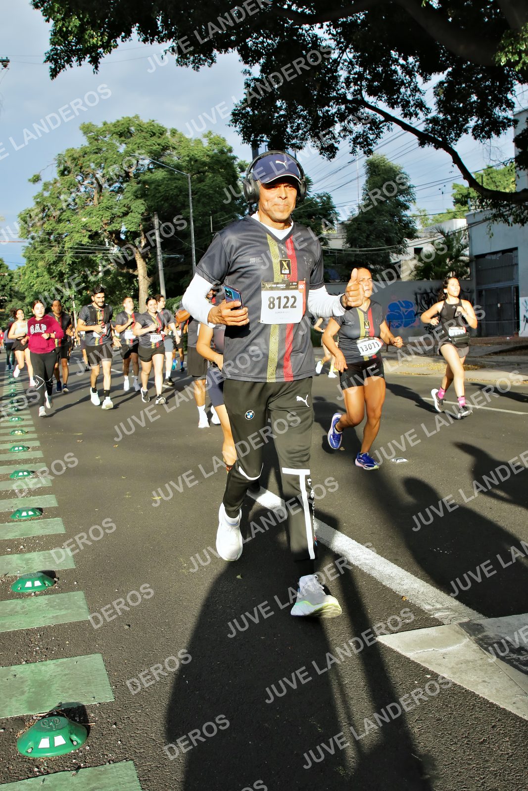 Foto de la X Carrera Leones Negros Red Cola 2026 en Rectoría General de la UdeG, Av. Juárez 976 (meta en Av. Enrique Díaz de León y Pedro Moreno), Guadalajara a las 07:45 · dorsal 8122, 13011