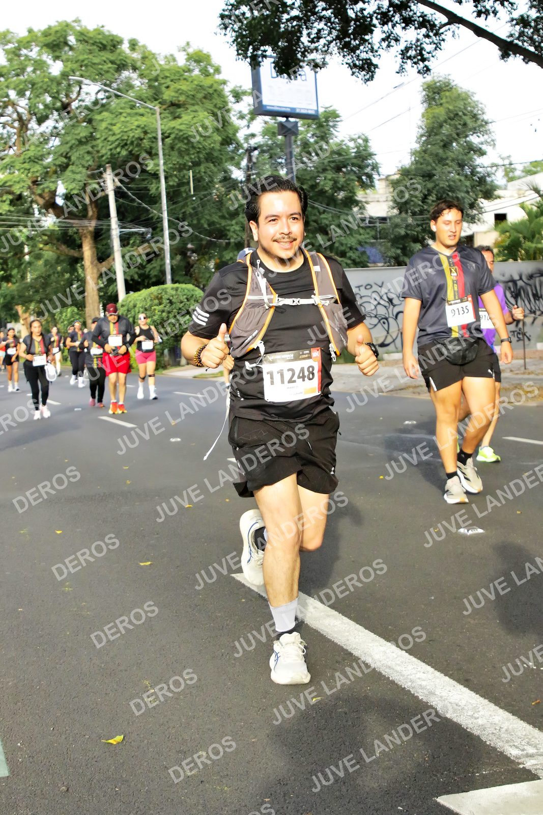Foto de la X Carrera Leones Negros Red Cola 2026 en Rectoría General de la UdeG, Av. Juárez 976 (meta en Av. Enrique Díaz de León y Pedro Moreno), Guadalajara a las 08:05 · dorsal 11248, 9135, 910