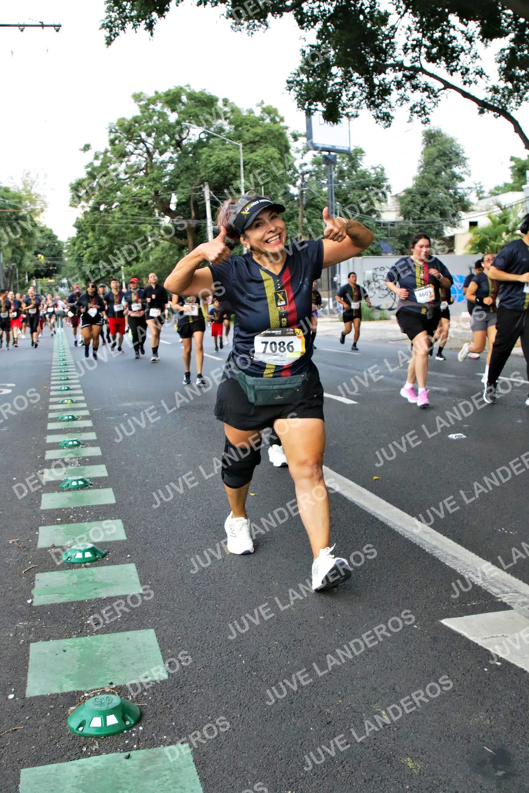 Foto de la X Carrera Leones Negros Red Cola 2026 en Rectoría General de la UdeG, Av. Juárez 976 (meta en Av. Enrique Díaz de León y Pedro Moreno), Guadalajara a las 05:11 · dorsal 7086, 4605
