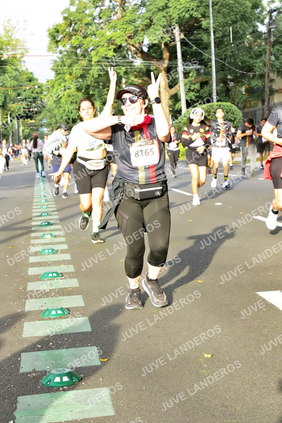 Foto de la X Carrera Leones Negros Red Cola 2026 en Rectoría General de la UdeG, Av. Juárez 976 (meta en Av. Enrique Díaz de León y Pedro Moreno), Guadalajara a las 08:02 · dorsal 8165