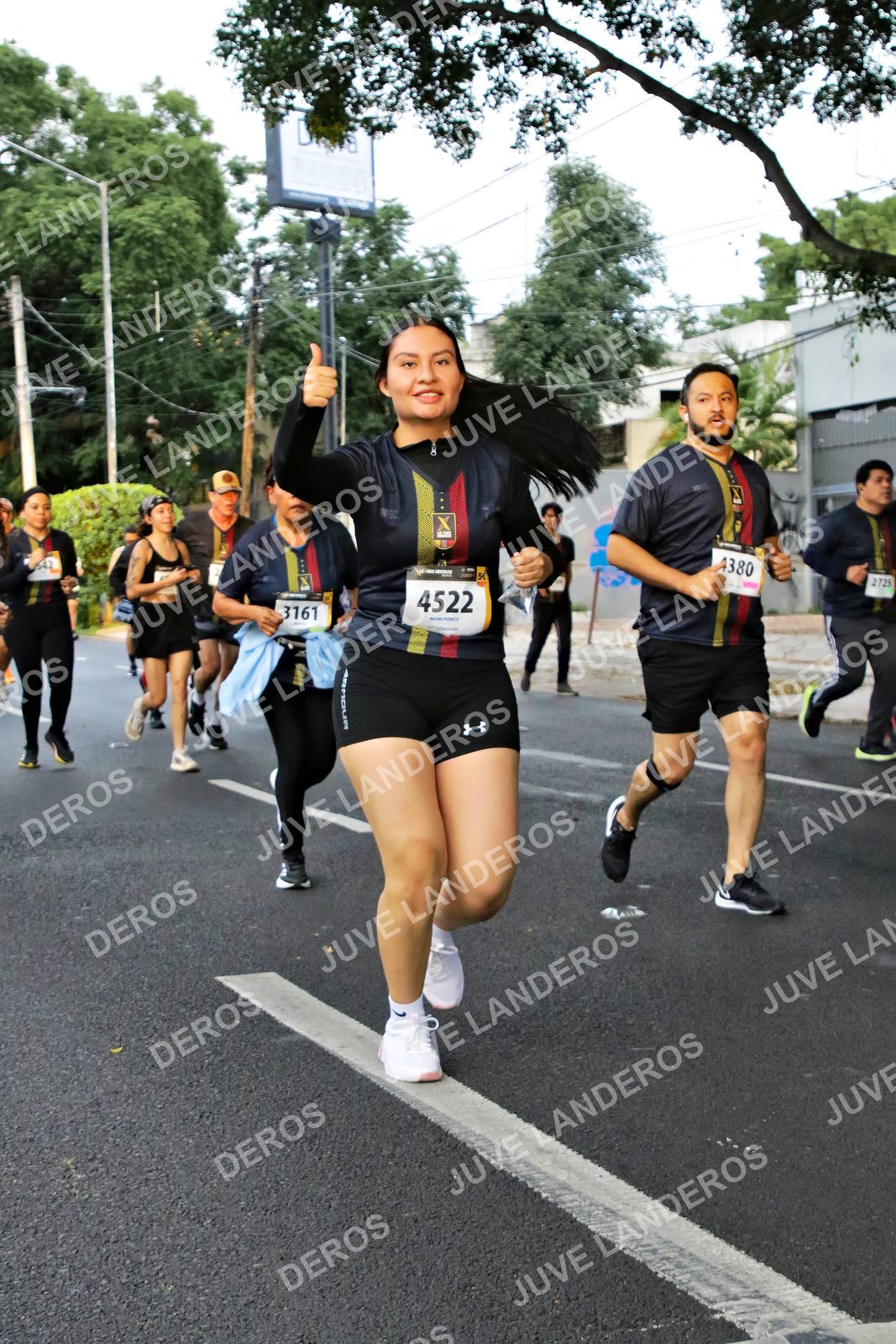 Foto de la X Carrera Leones Negros Red Cola 2026 en Rectoría General de la UdeG, Av. Juárez 976 (meta en Av. Enrique Díaz de León y Pedro Moreno), Guadalajara a las 05:08 · dorsal 4522, 3161, 4380, 2725